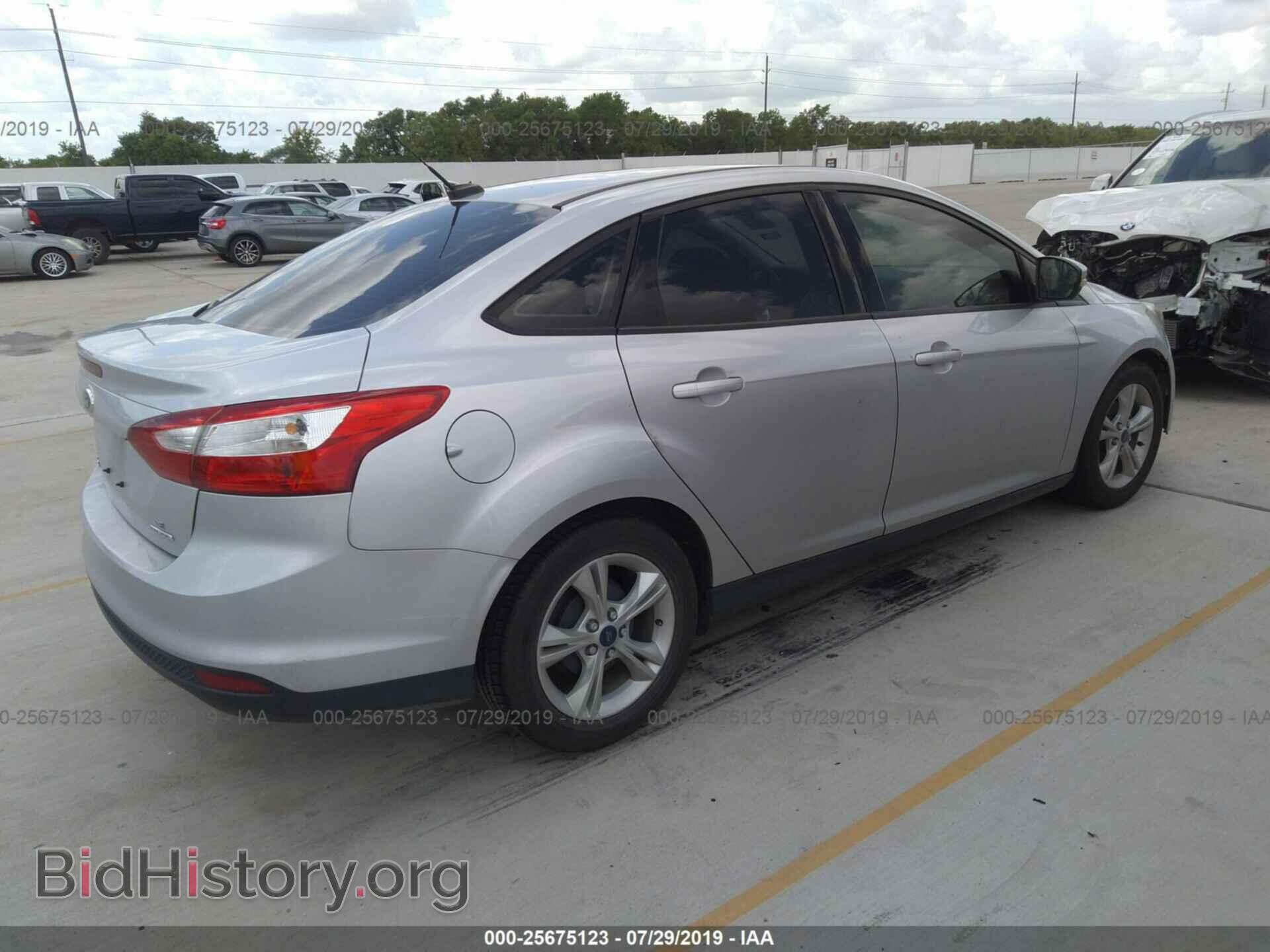 2014 FORD FOCUS - VIN: 1FADP3F2XEL389877 - Photo 4