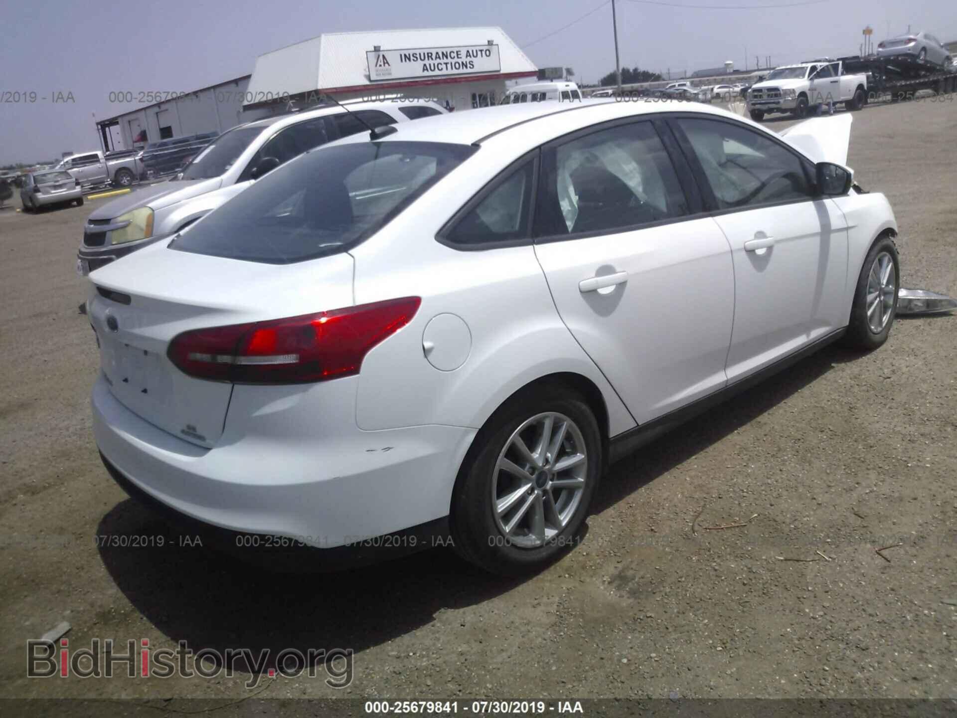 2015 FORD FOCUS - VIN: 1FADP3F21FL255034 - Photo 4