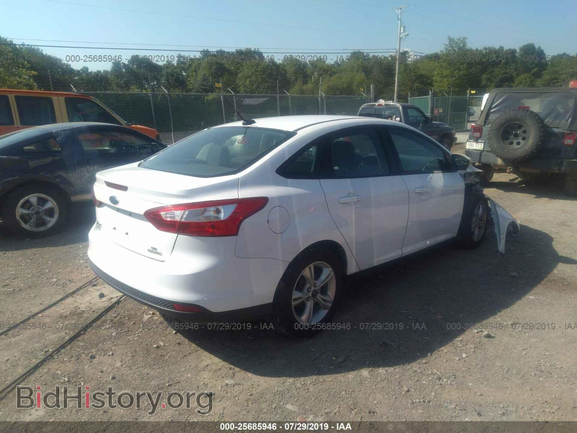 2014 FORD FOCUS - VIN: 1FADP3F21EL380209 - Photo 4