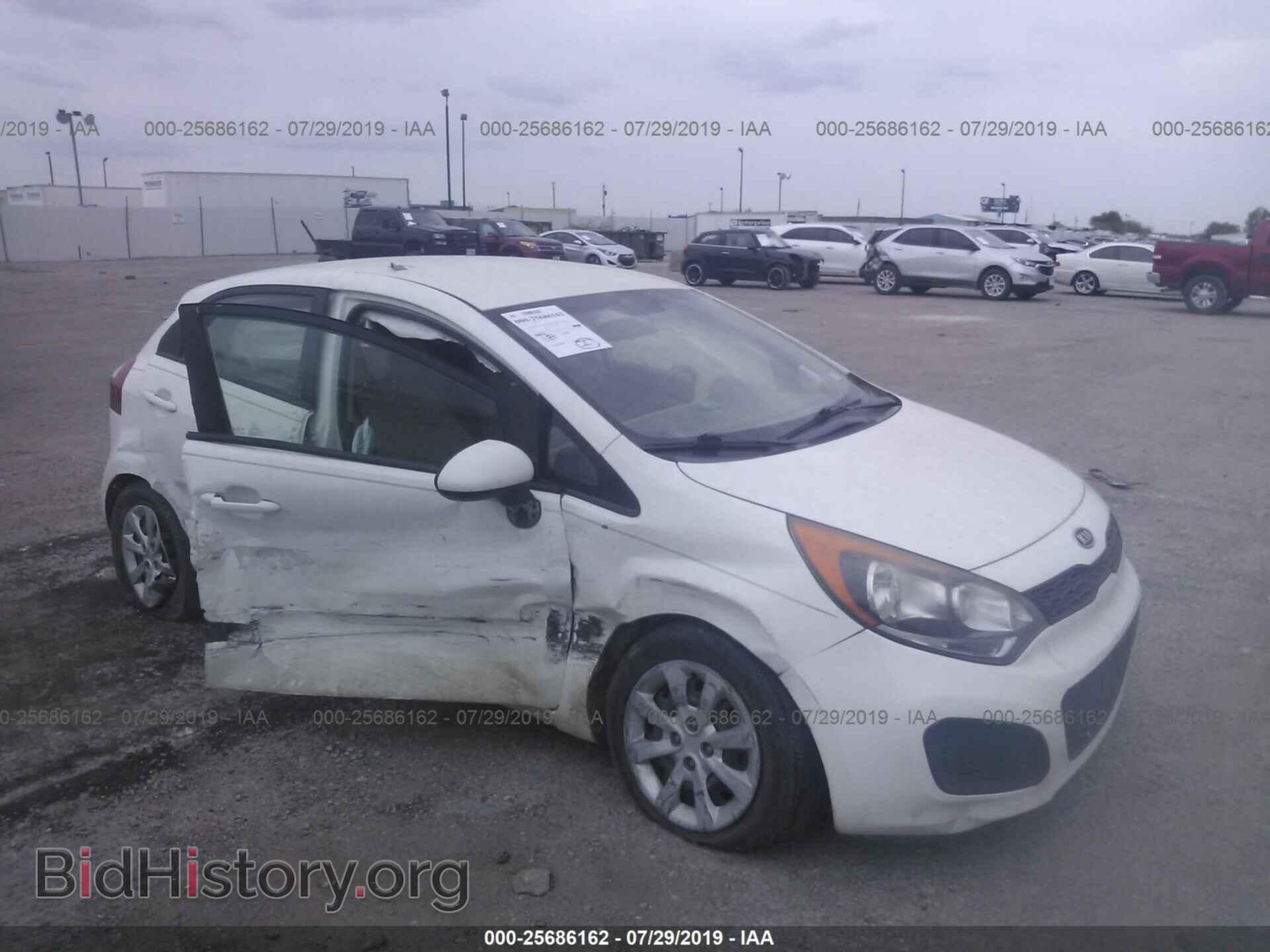 Фотография KNADM5A32C6020115 - KIA RIO 2012