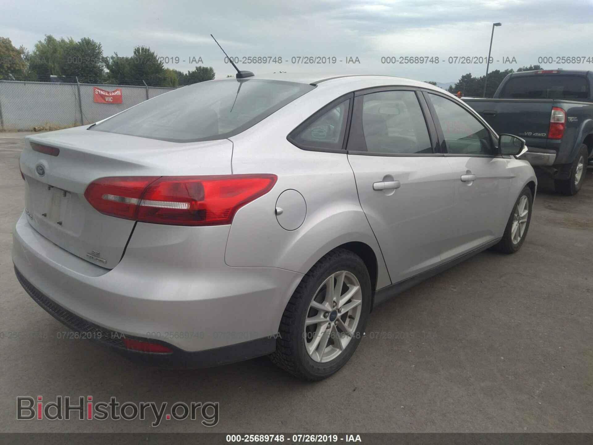 2015 FORD FOCUS - VIN: 1FADP3F21FL368918 - Photo 4