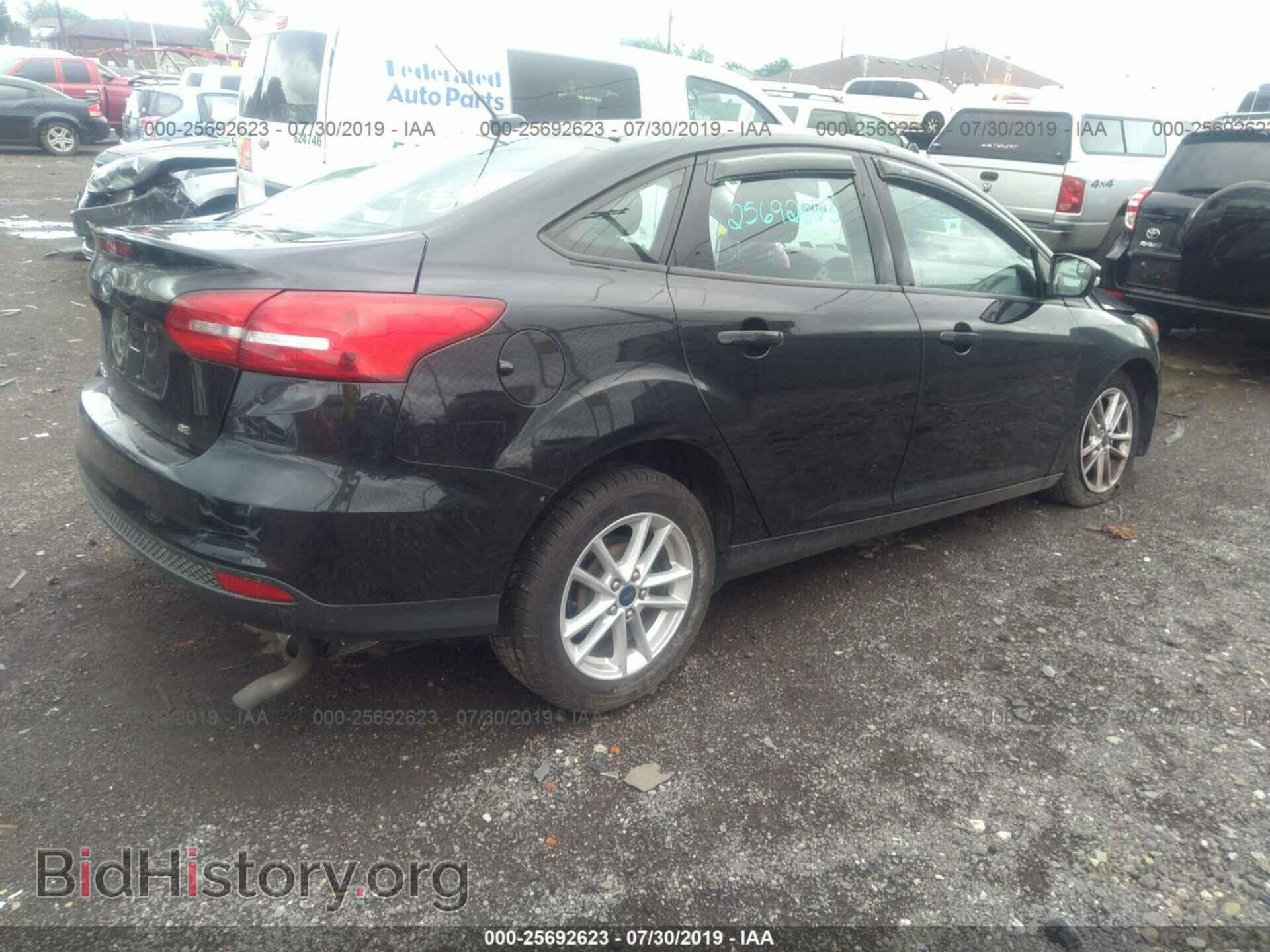2015 FORD FOCUS - VIN: 1FADP3F27FL296557 - Photo 4