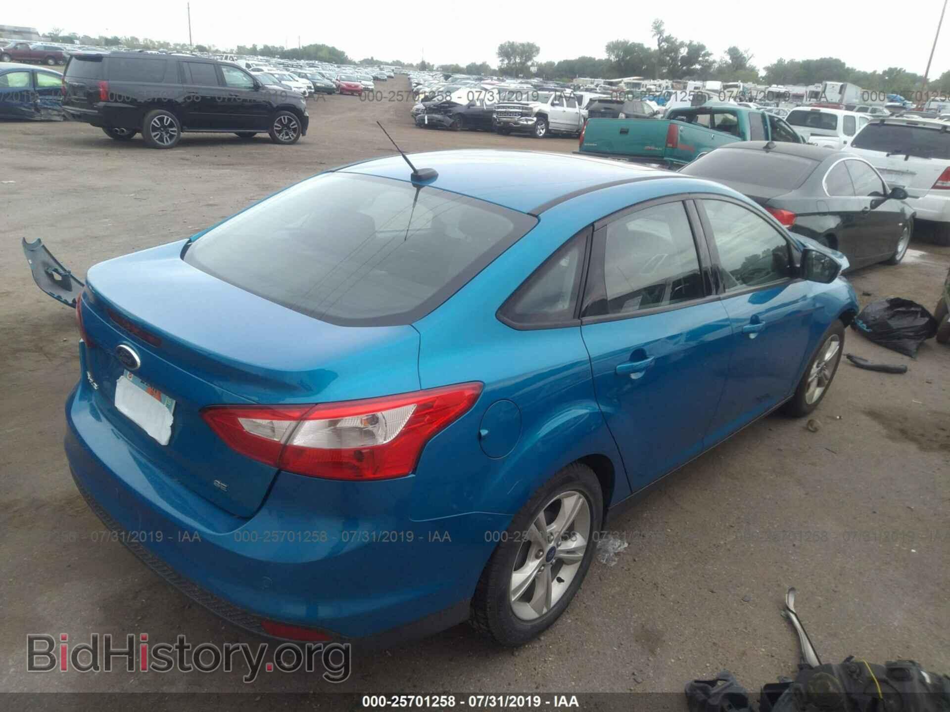 2014 FORD FOCUS - VIN: 1FADP3F20EL198422 - Photo 4