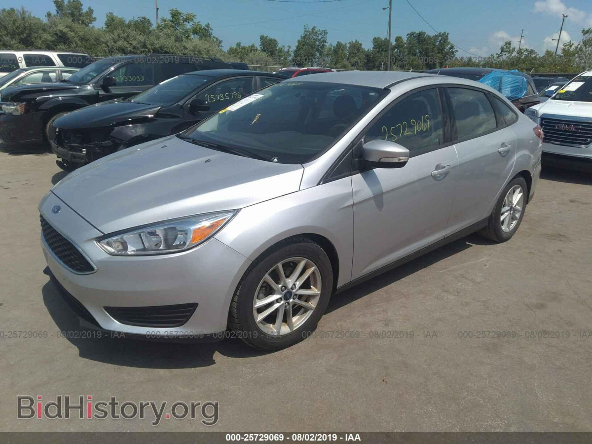2016 FORD FOCUS - VIN: 1FADP3F22GL364703 - Фото 2