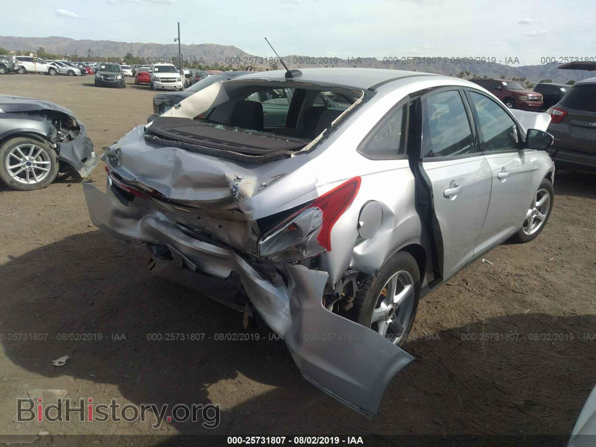 2014 FORD FOCUS - VIN: 1FADP3F21EL241908 - Photo 4