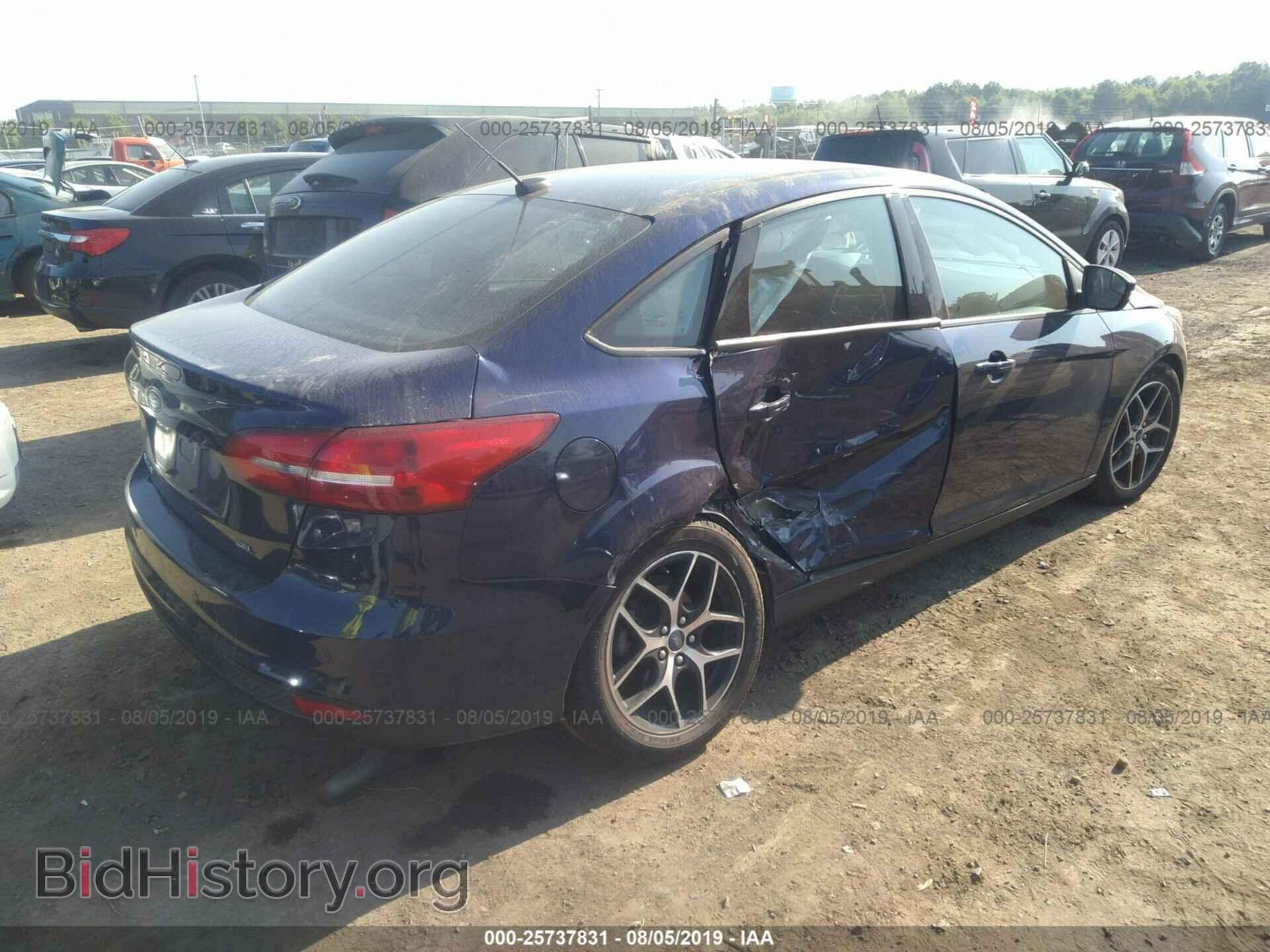 2017 FORD FOCUS - VIN: 1FADP3H25HL228869 - Photo 4