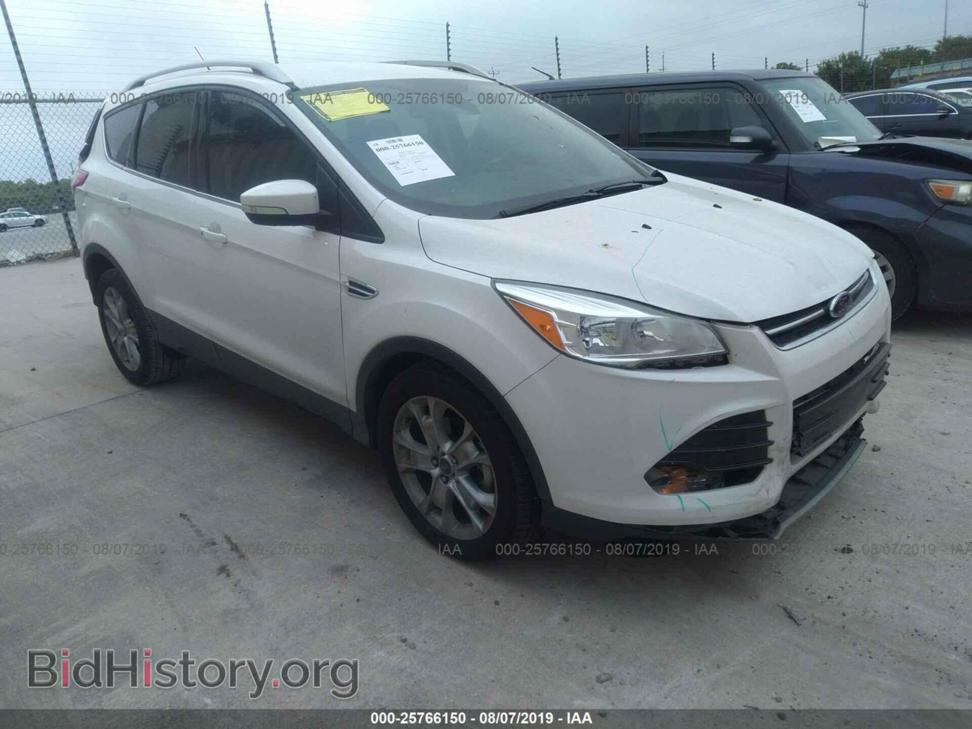 Фотография 1FMCU0JX8EUD00720 - FORD ESCAPE 2014