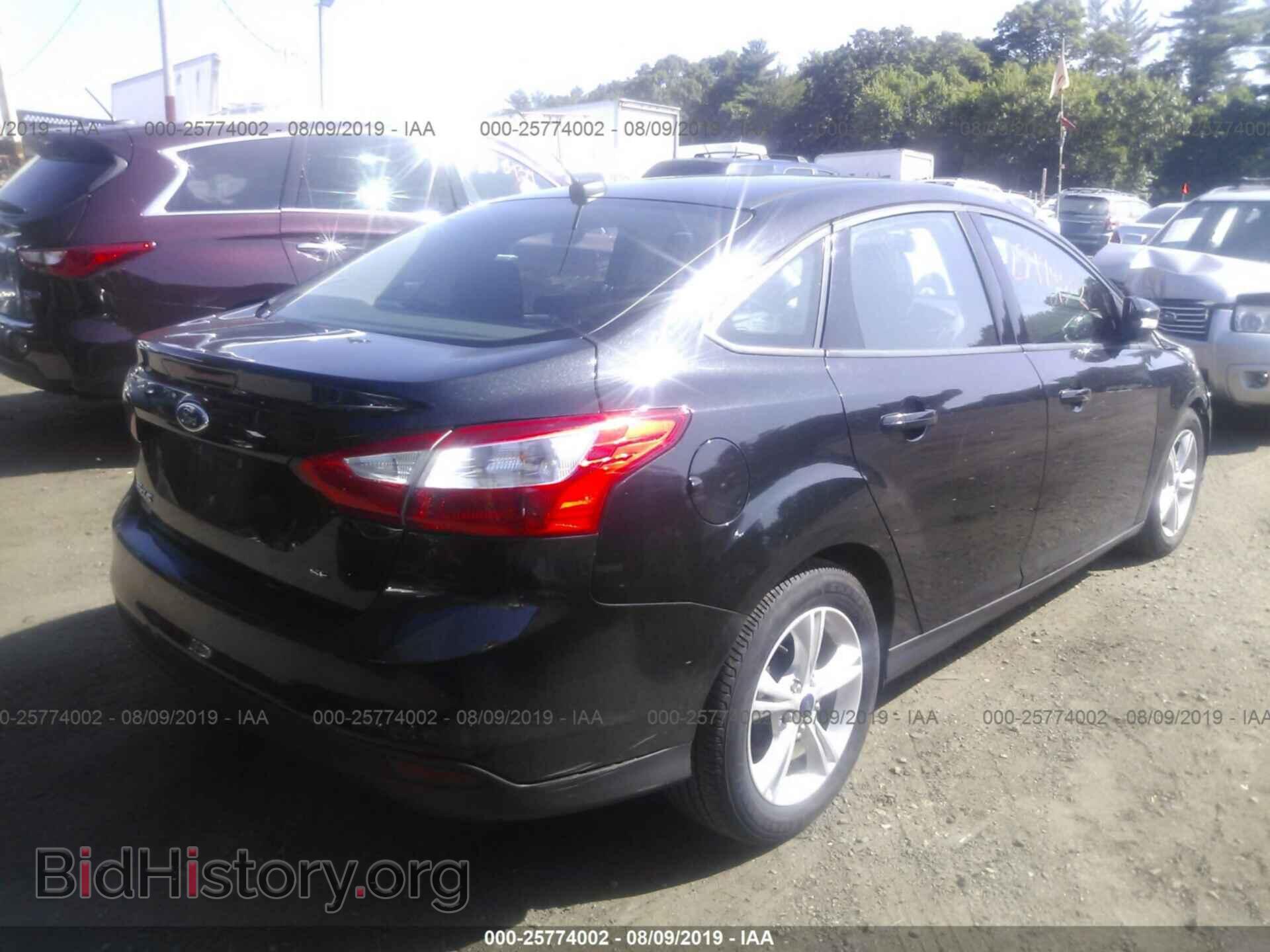 2014 FORD FOCUS - VIN: 1FADP3F22EL434469 - Photo 4