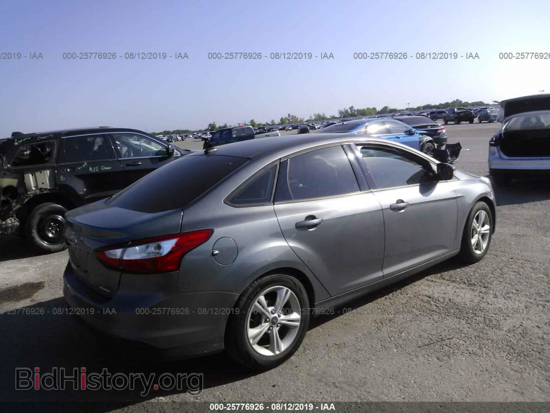 2014 FORD FOCUS - VIN: 1FADP3F2XEL218286 - Photo 4