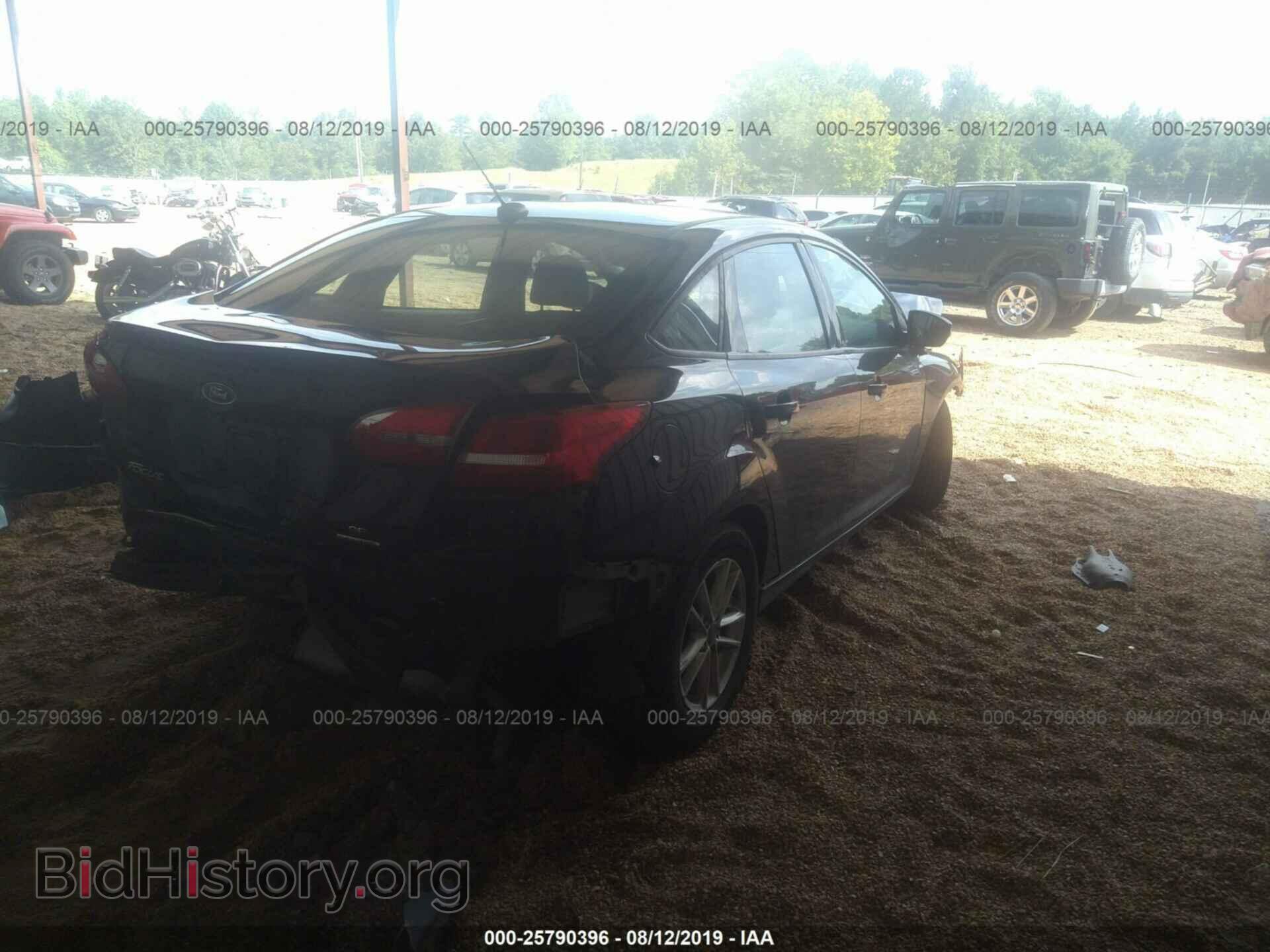 2016 FORD FOCUS - VIN: 1FADP3F25GL291312 - Photo 4