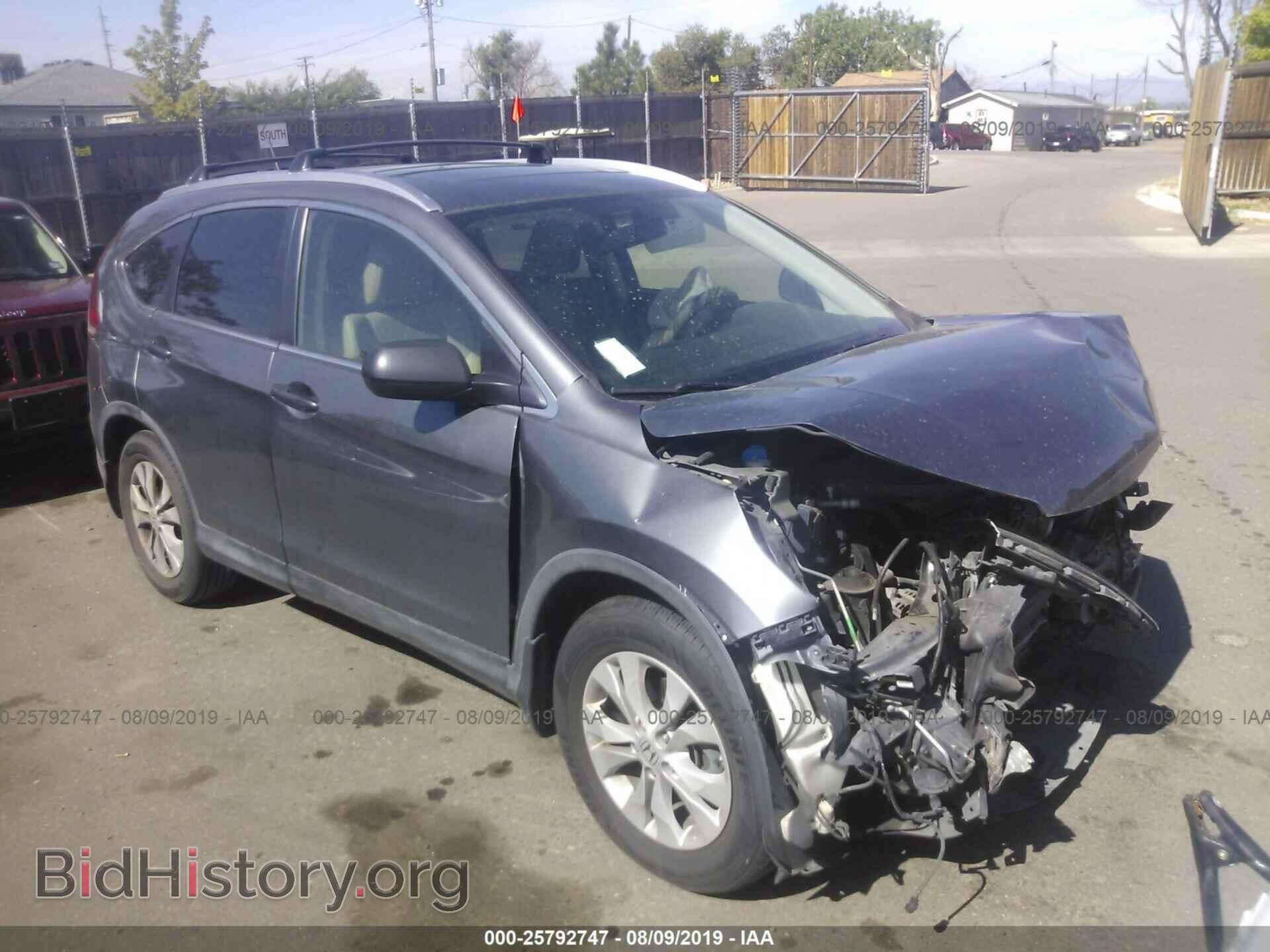 Фотография JHLRM3H77CC010027 - HONDA CR-V 2012