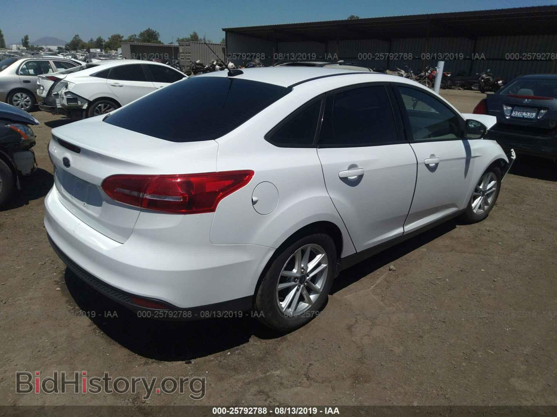 2016 FORD FOCUS - VIN: 1FADP3F22GL263001 - Photo 4