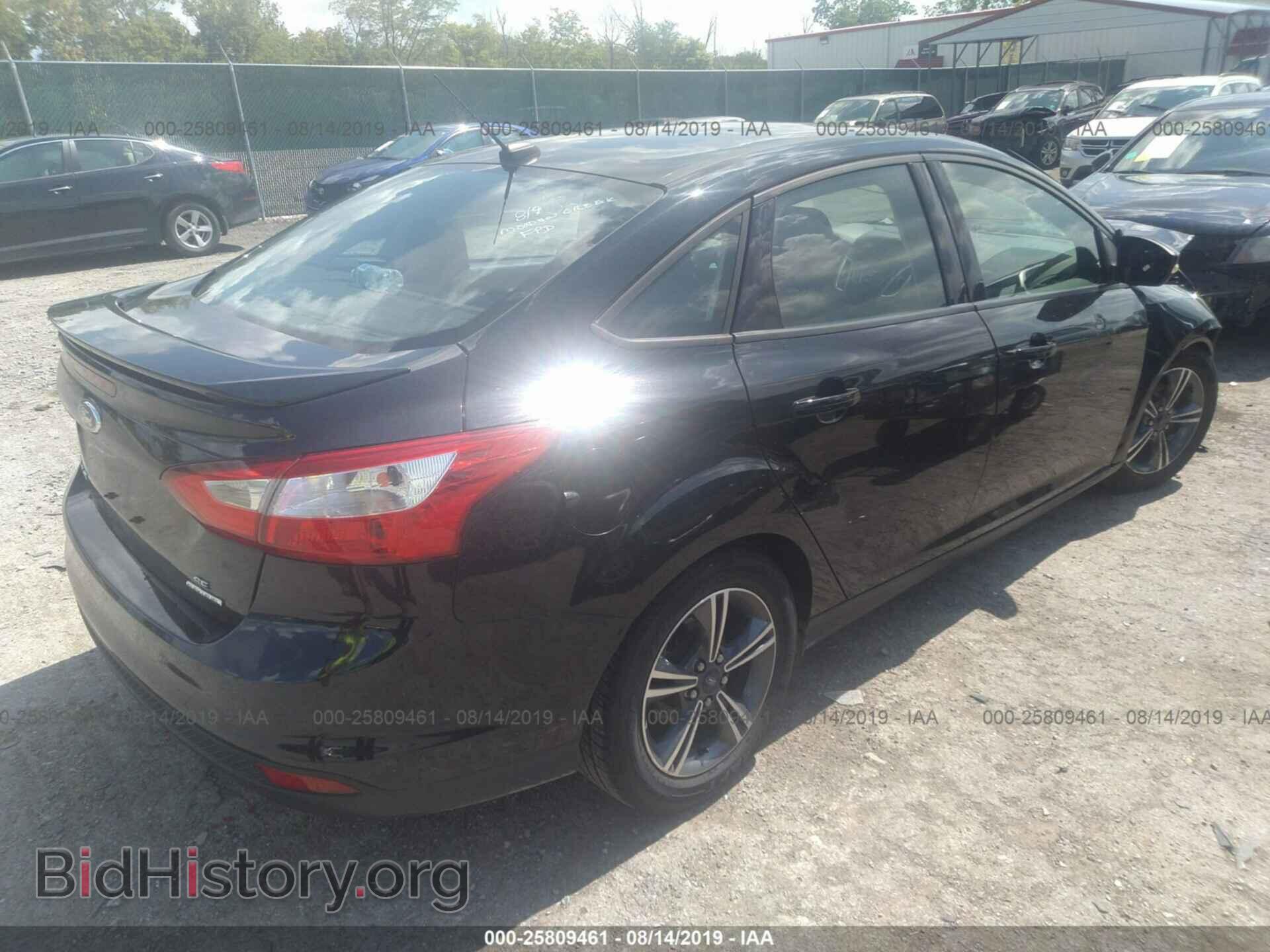 2014 FORD FOCUS - VIN: 1FADP3F22EL329933 - Photo 4