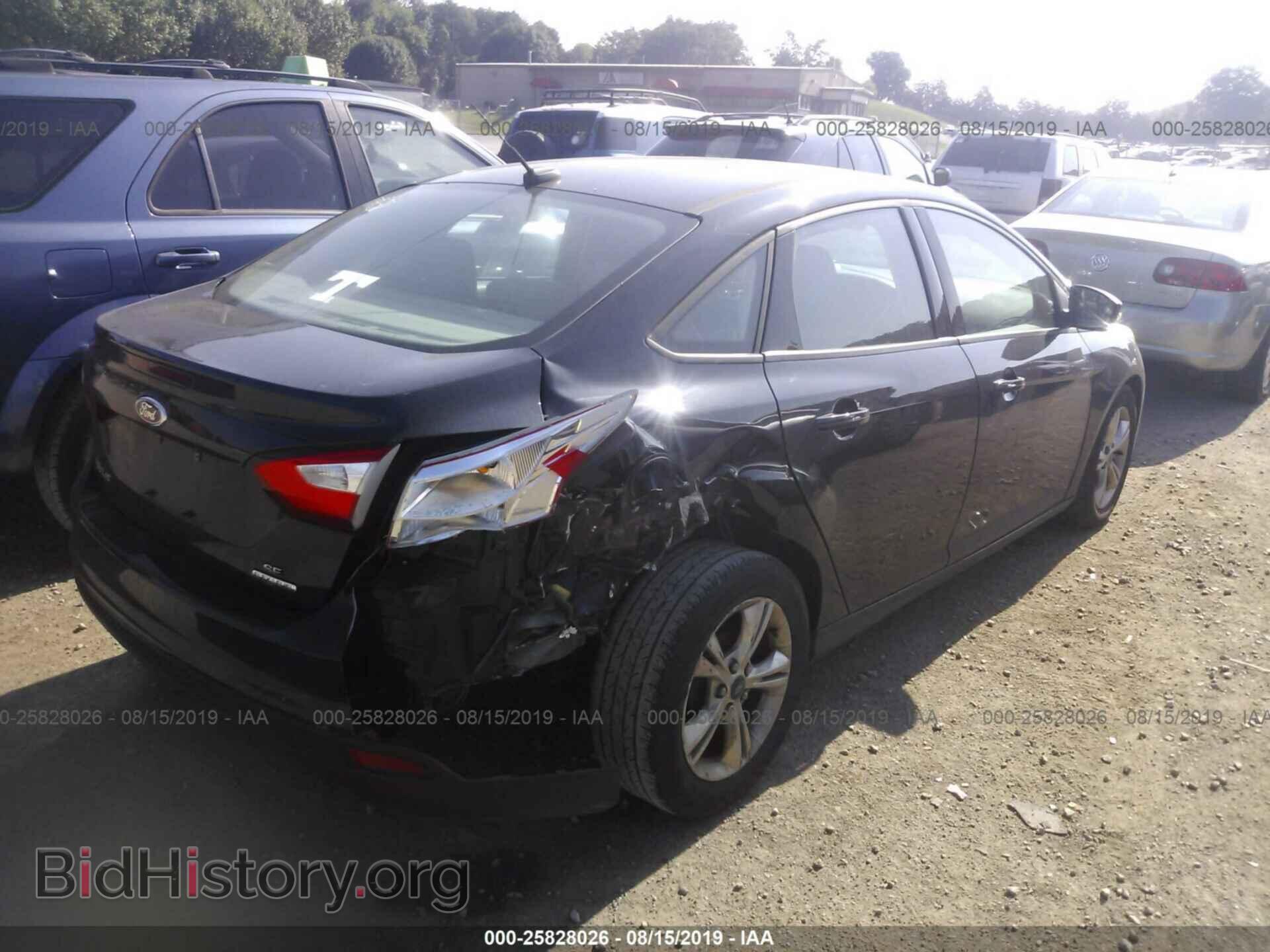 2014 FORD FOCUS - VIN: 1FADP3F25EL299200 - Photo 4