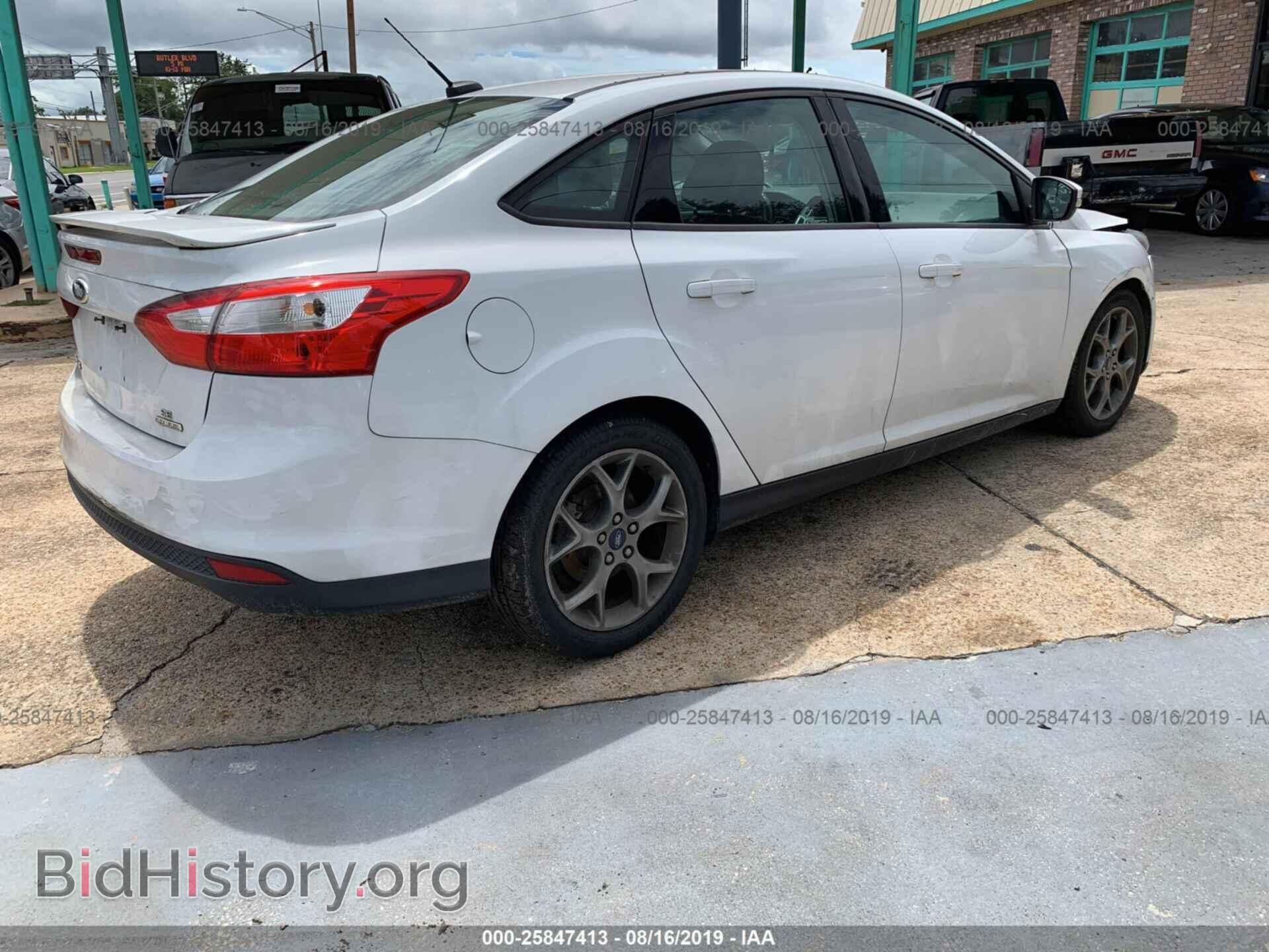 2013 FORD FOCUS - VIN: 1FADP3F22DL205210 - Photo 4