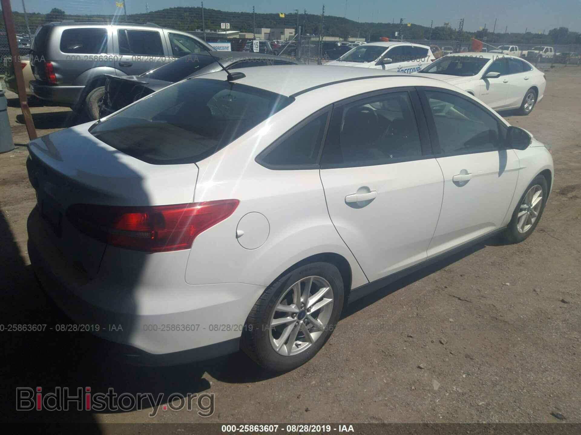 2015 FORD FOCUS - VIN: 1FADP3F27FL335616 - Photo 4