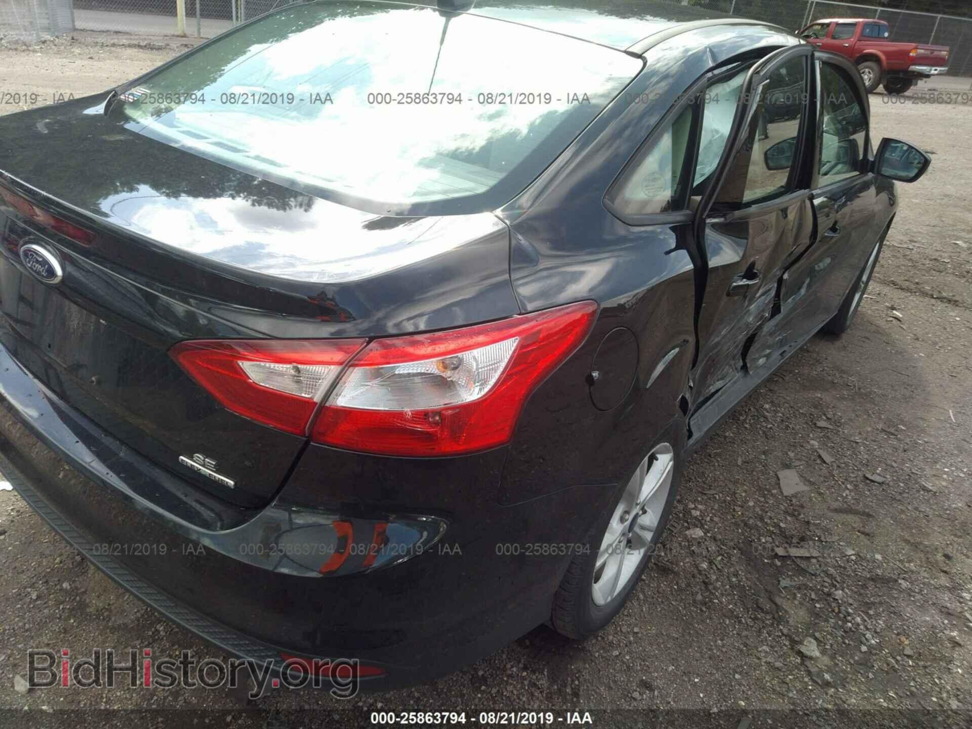 2014 FORD FOCUS - VIN: 1FADP3F20EL404709 - Photo 4