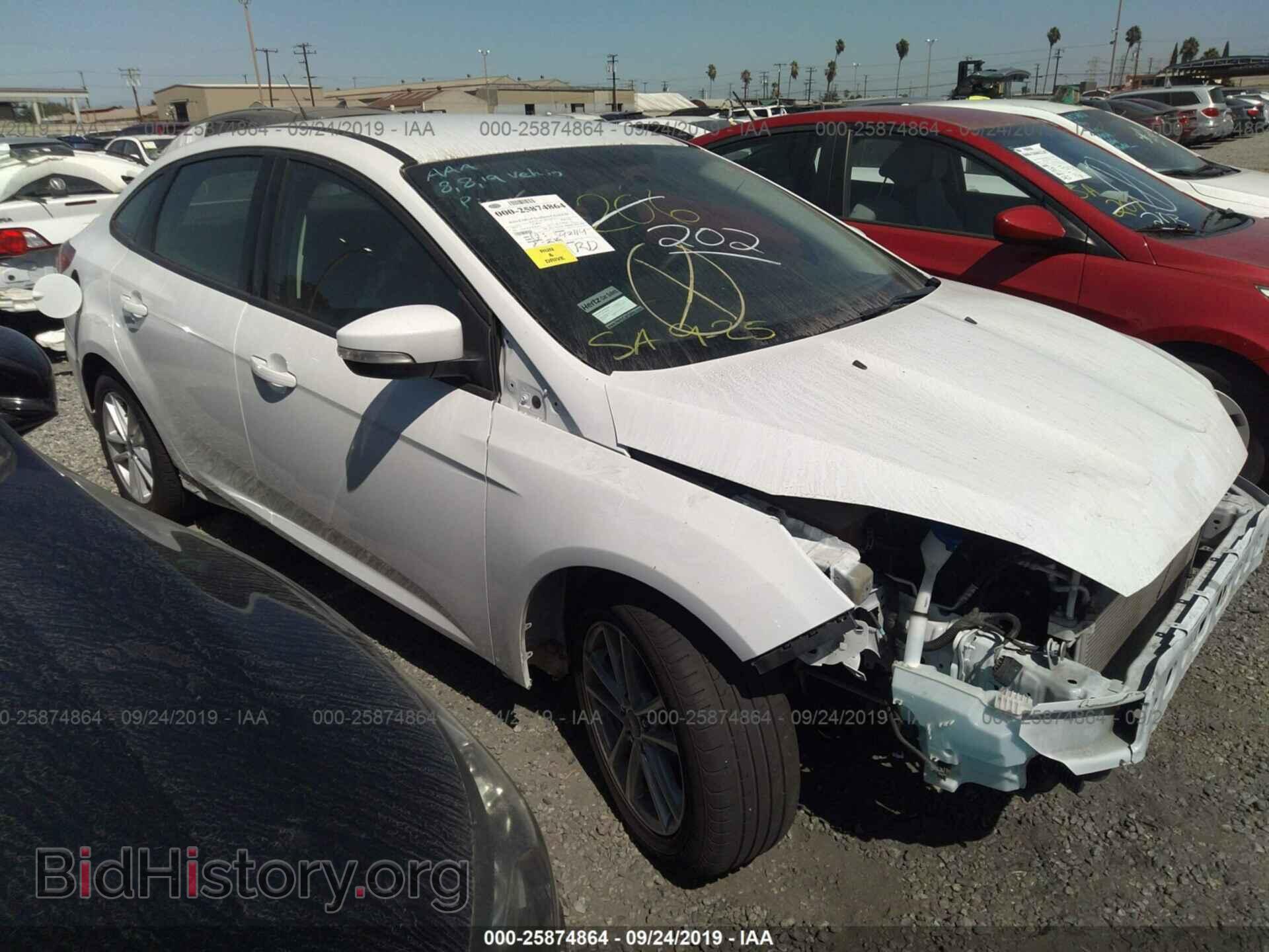 Фотография 1FADP3F2XHL296474 - FORD FOCUS 2017