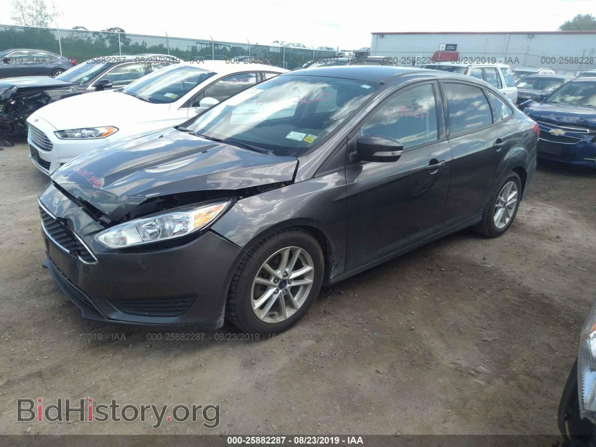 2016 FORD FOCUS - VIN: 1FADP3F22GL280655 - Фото 2