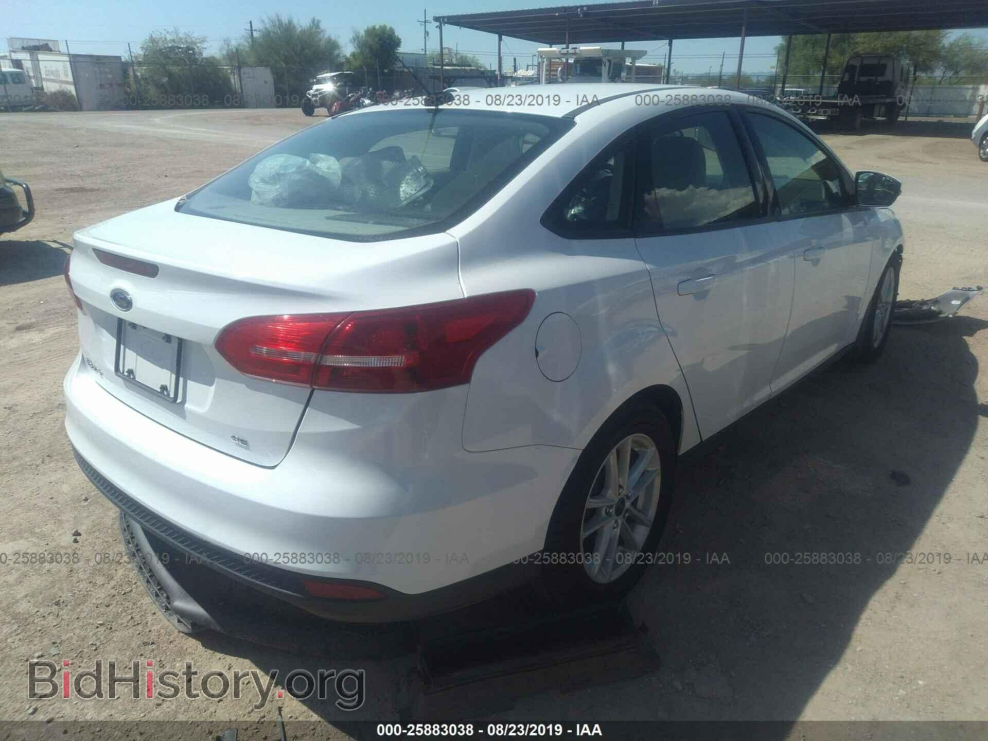 2015 FORD FOCUS - VIN: 1FADP3F29FL206096 - Photo 4