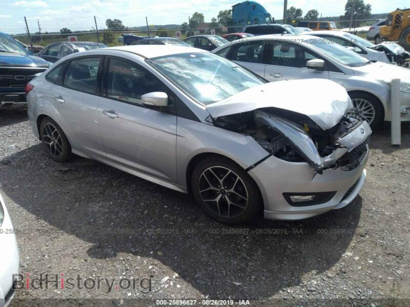 2016 Ford FOCUS SE (VIN 1FADP3F20GL313328) — photo 1 of 10, IAAI, damage: front end