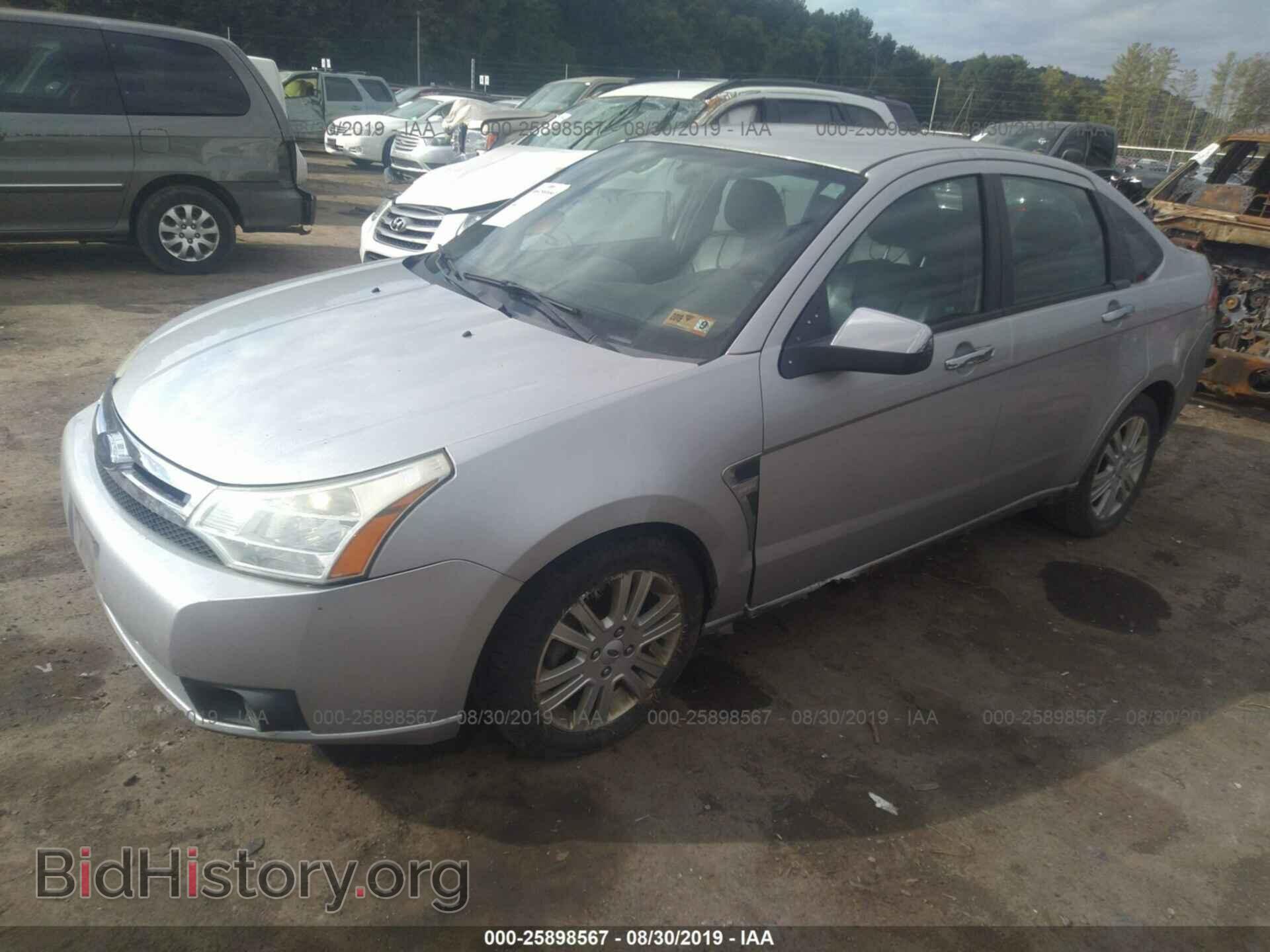 2009 FORD FOCUS - VIN: 1FAHP37N49W200736 - Photo 2