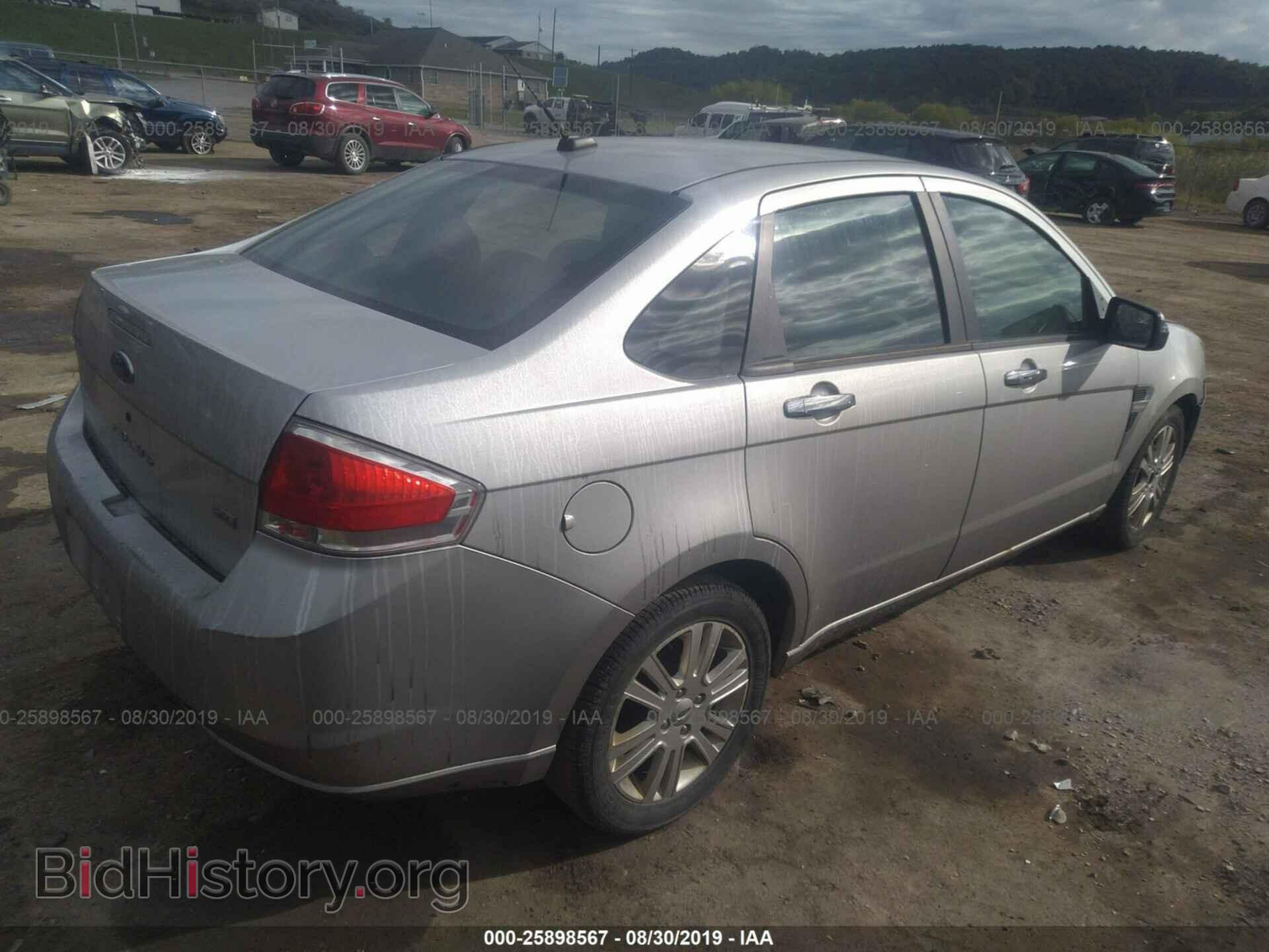 2009 FORD FOCUS - VIN: 1FAHP37N49W200736 - Photo 4