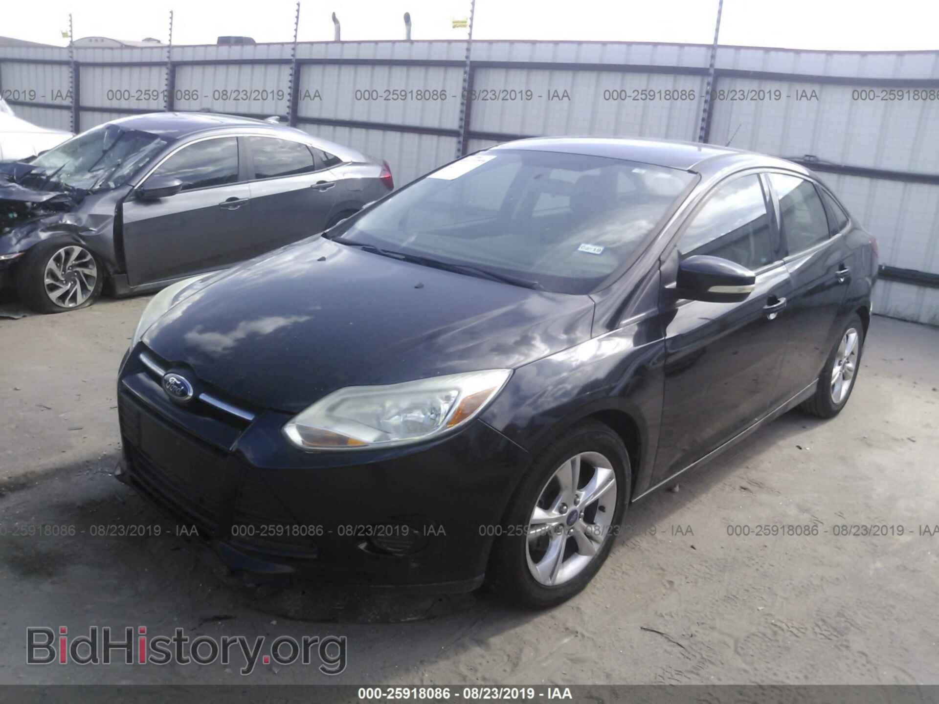 2014 Ford Focus - VIN: 1FADP3F21EL131215 - Photo 2