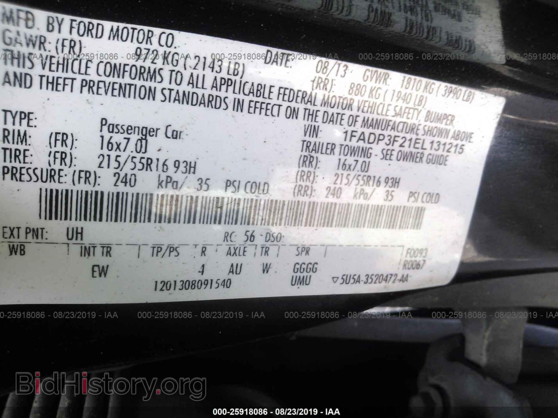 2014 Ford Focus - VIN: 1FADP3F21EL131215 - Photo 9