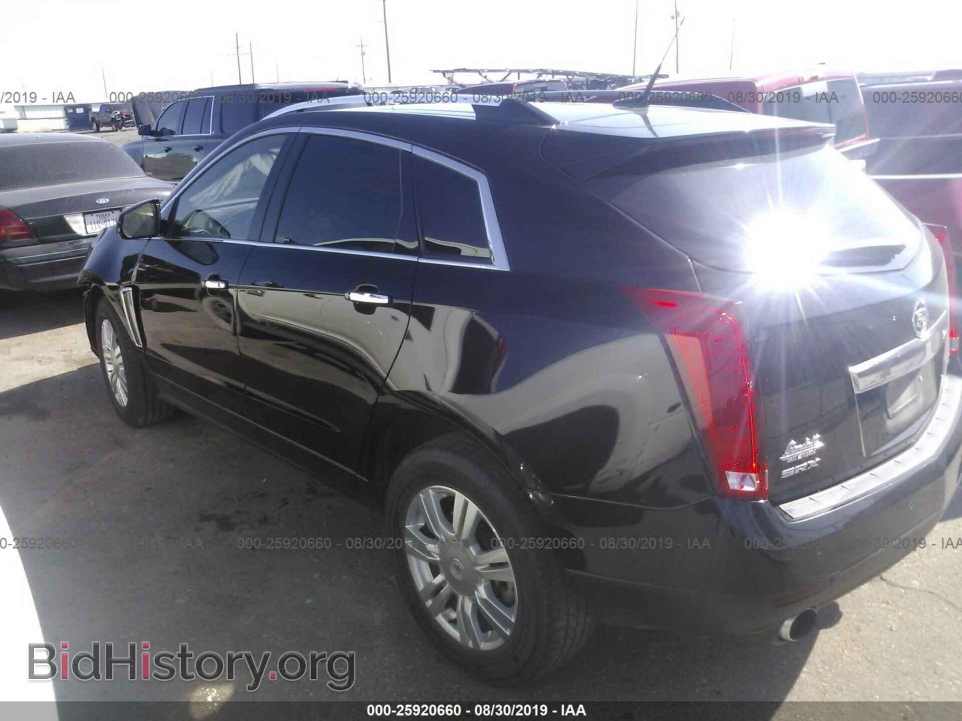 2014 CADILLAC SRX - VIN: 3GYFNBE36ES659723 - Фото 3