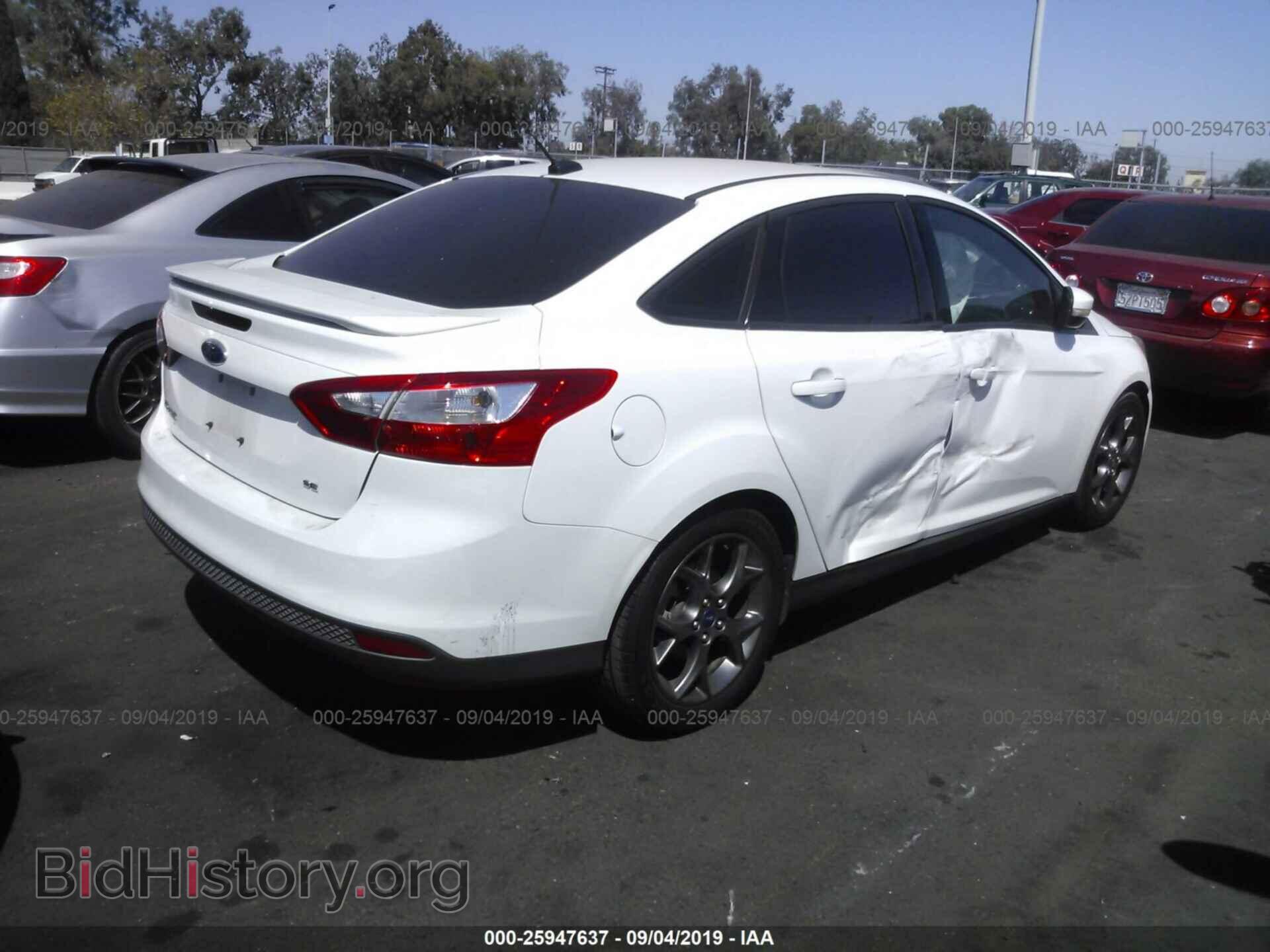 2014 FORD FOCUS - VIN: 1FADP3F2XEL110914 - Photo 4