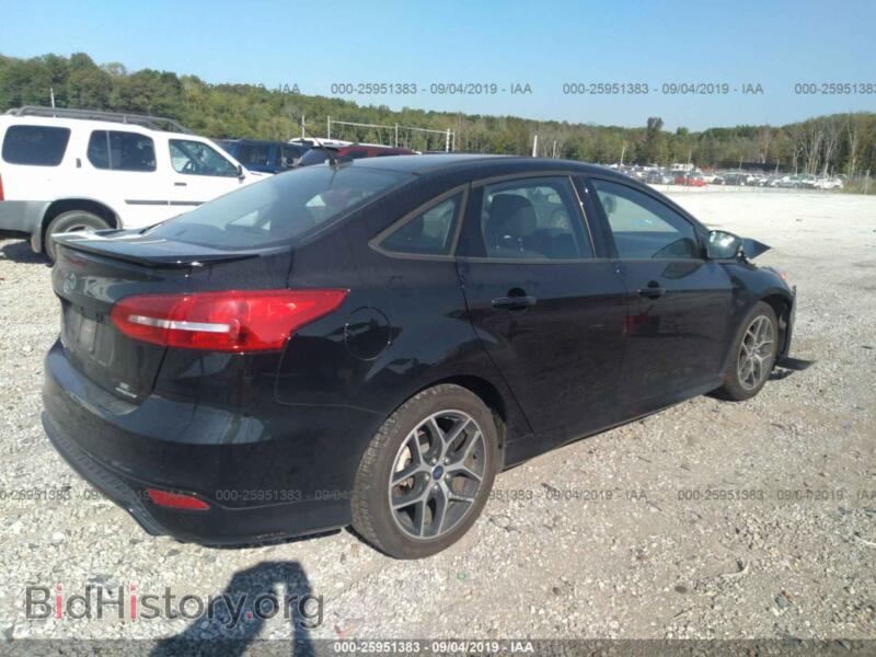2016 Ford FOCUS (VIN 1FADP3F21GL201041) — фото 4 из 10