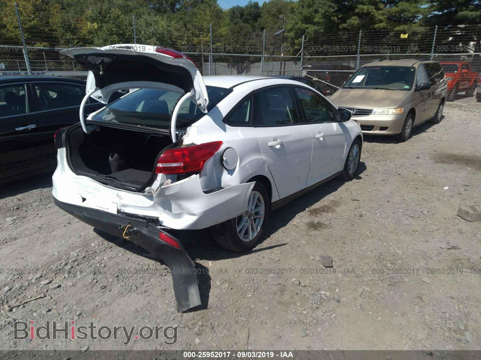 2016 FORD FOCUS - VIN: 1FADP3F24GL381406 - Photo 4