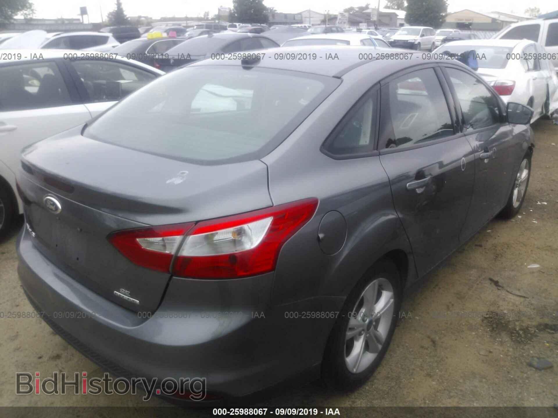2014 FORD FOCUS - VIN: 1FADP3F2XEL104885 - Photo 4