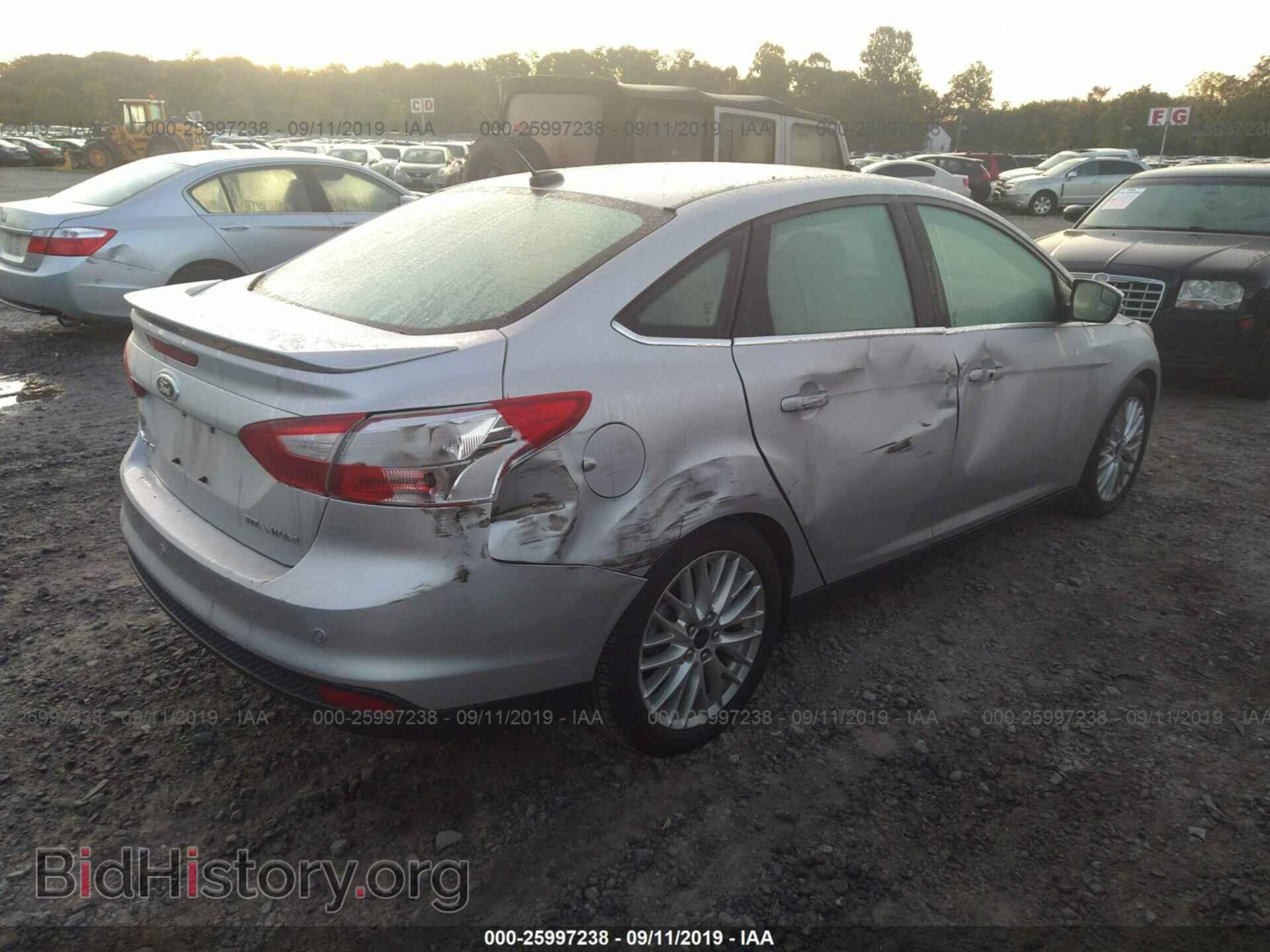 2014 FORD FOCUS - VIN: 1FADP3J21EL279422 - Photo 4