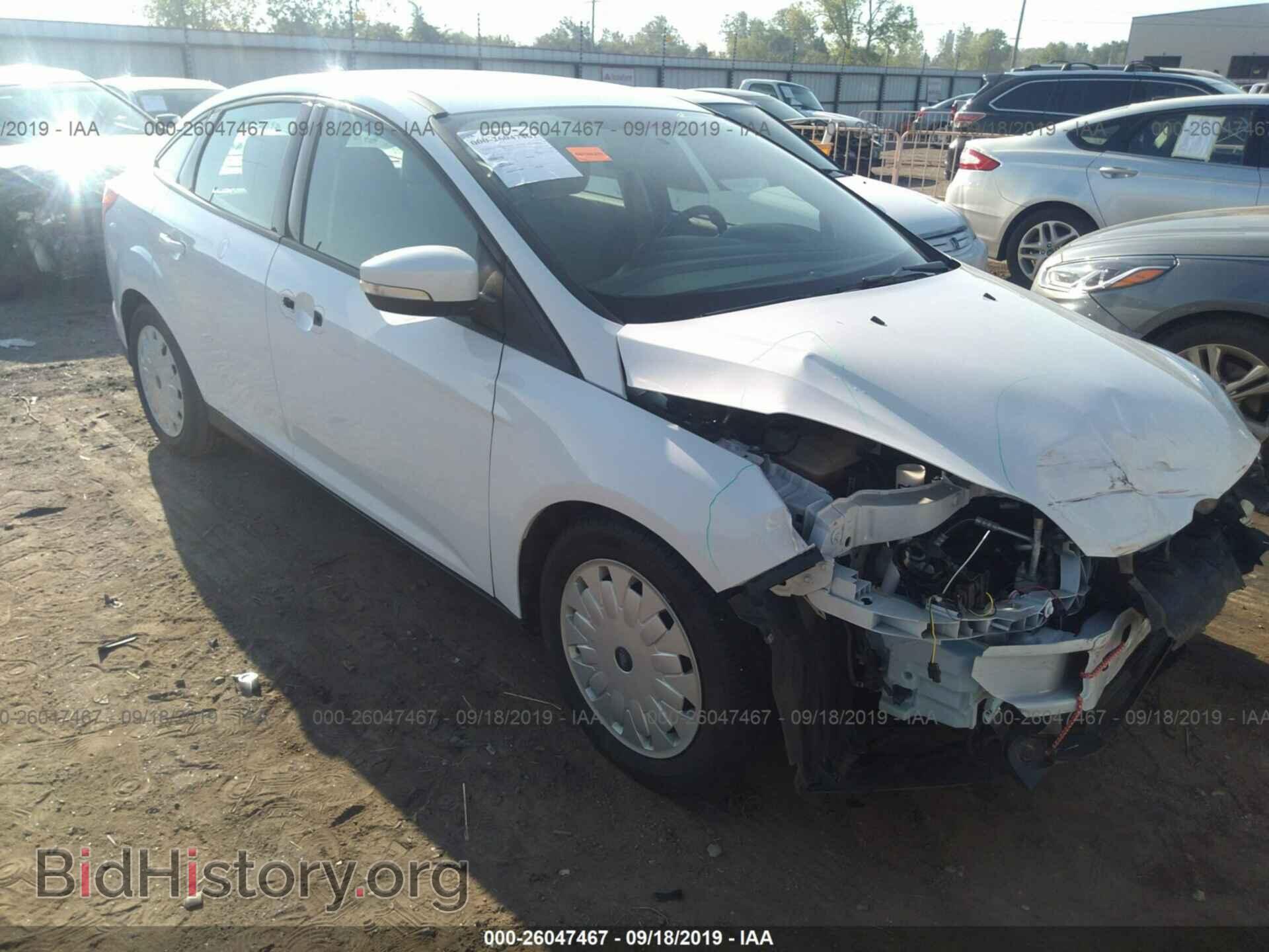 Фотография 1FADP3F24EL398672 - FORD FOCUS 2014