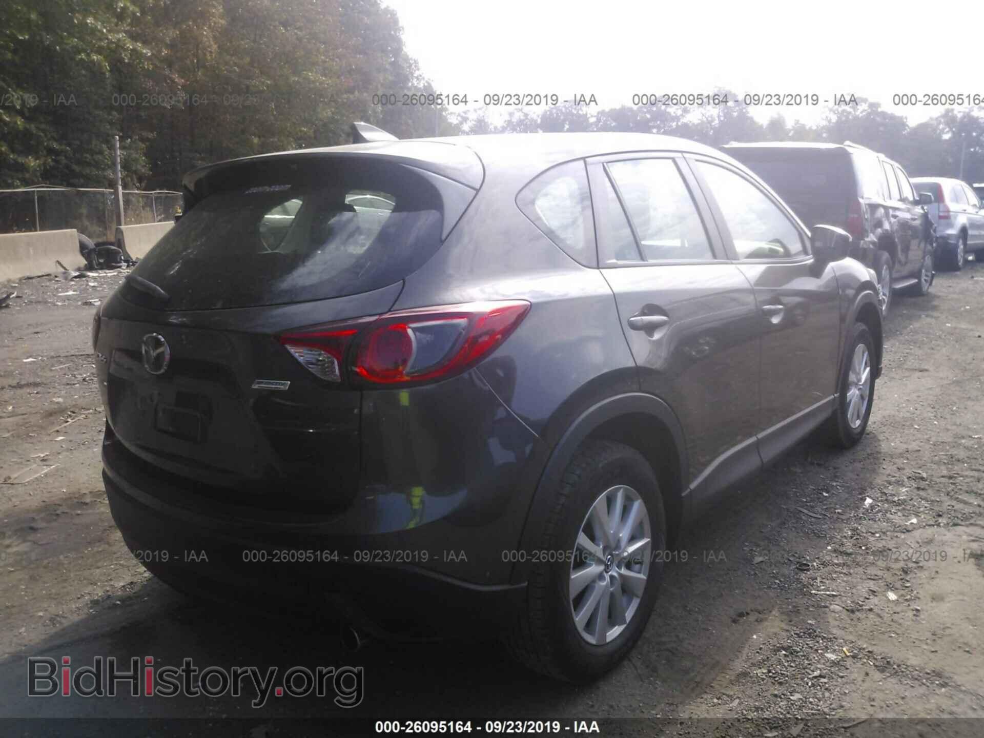 2016 MAZDA CX-5 - VIN: JM3KE2BY1G0630670 - Фото 4