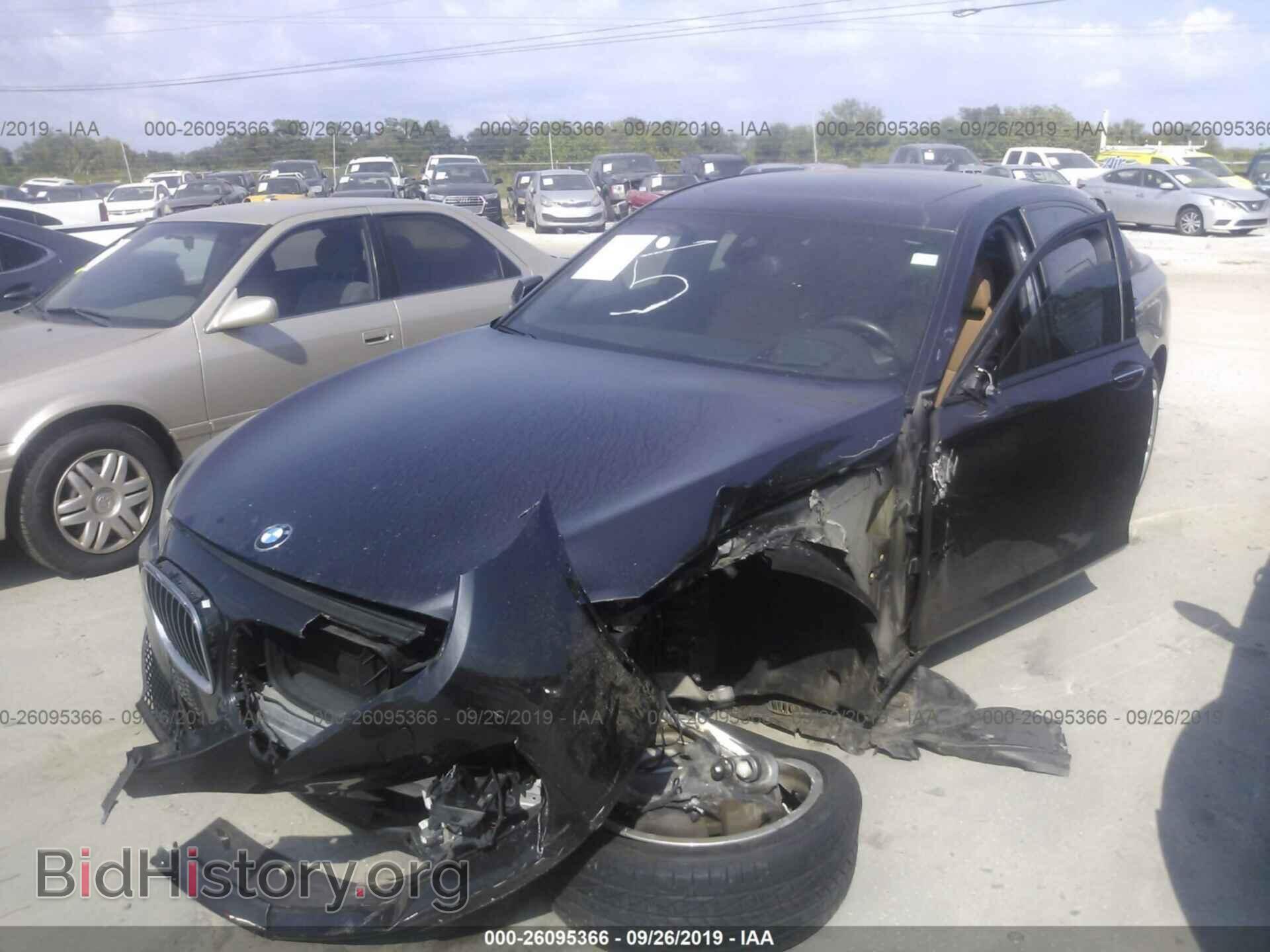 2014 BMW 740 - VIN: WBAYE4C59ED138281 - Фото 2