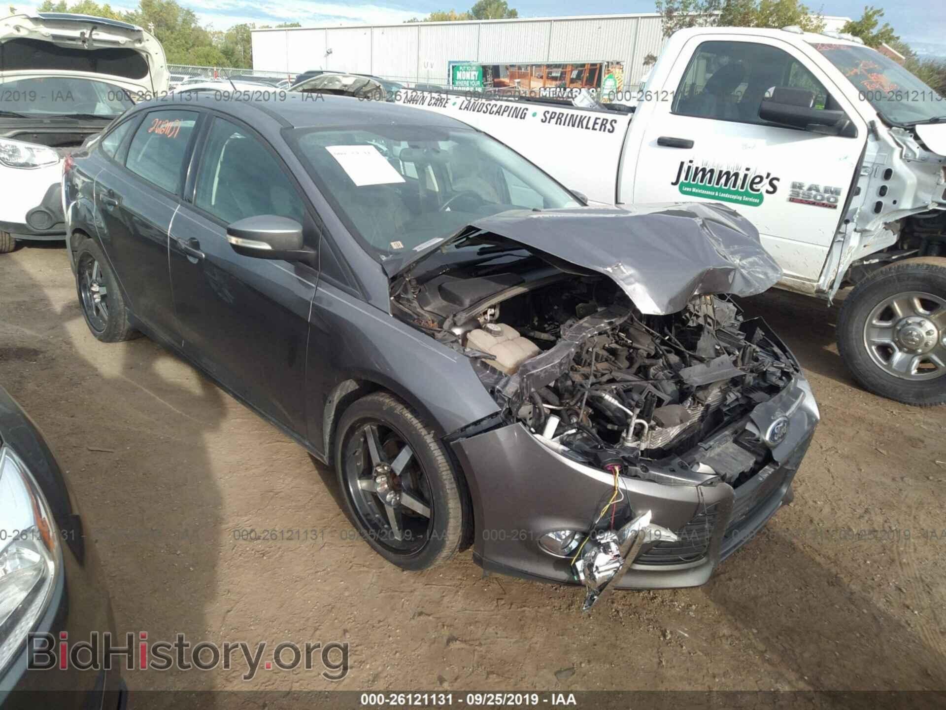 Фотография 1FADP3F28DL283636 - FORD FOCUS 2013