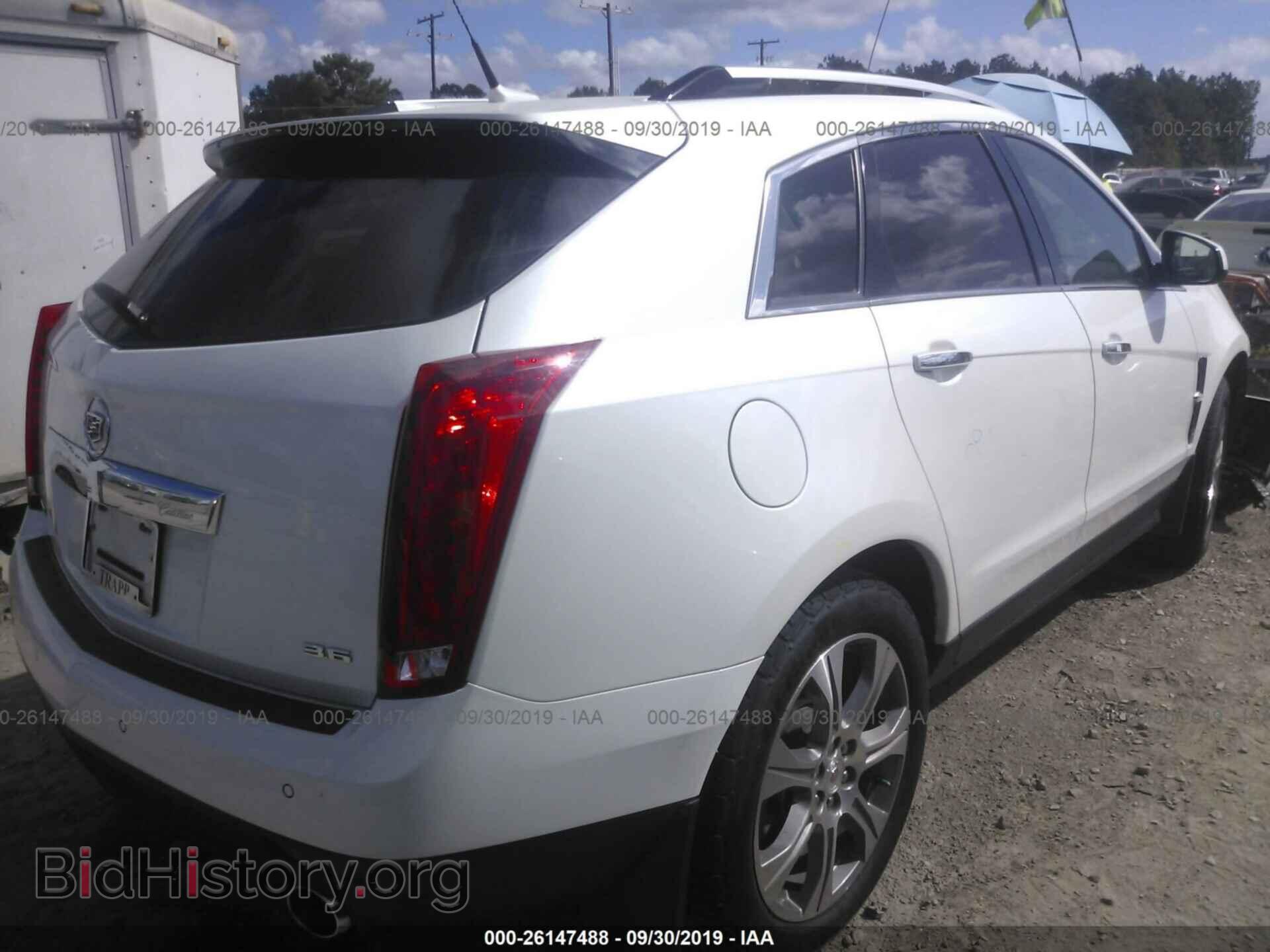 2012 CADILLAC SRX - VIN: 3GYFNCE34CS631079 - Фото 4