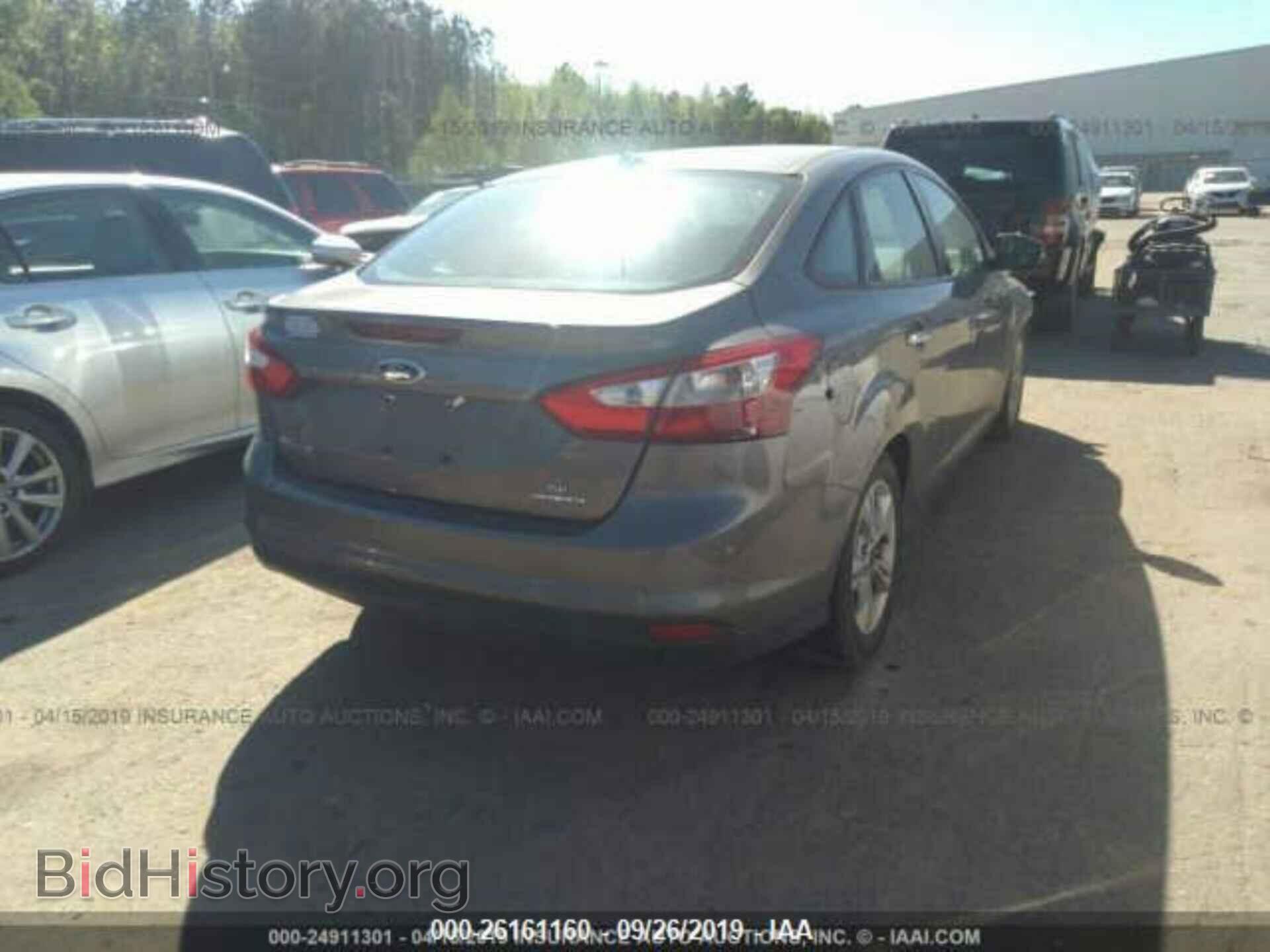 2014 FORD FOCUS - VIN: 1FADP3F27EL205074 - Photo 4