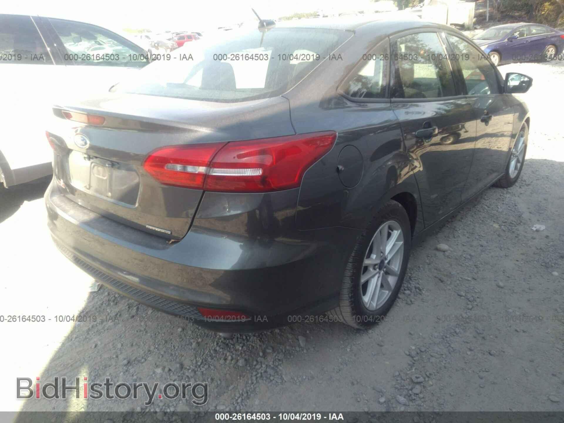 2015 FORD FOCUS - VIN: 1FADP3F27FL204234 - Photo 4