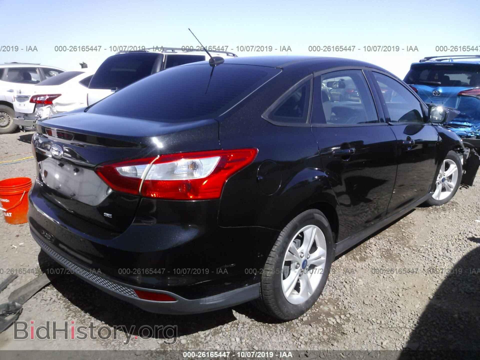 2014 FORD FOCUS - VIN: 1FADP3F20EL382596 - Photo 4