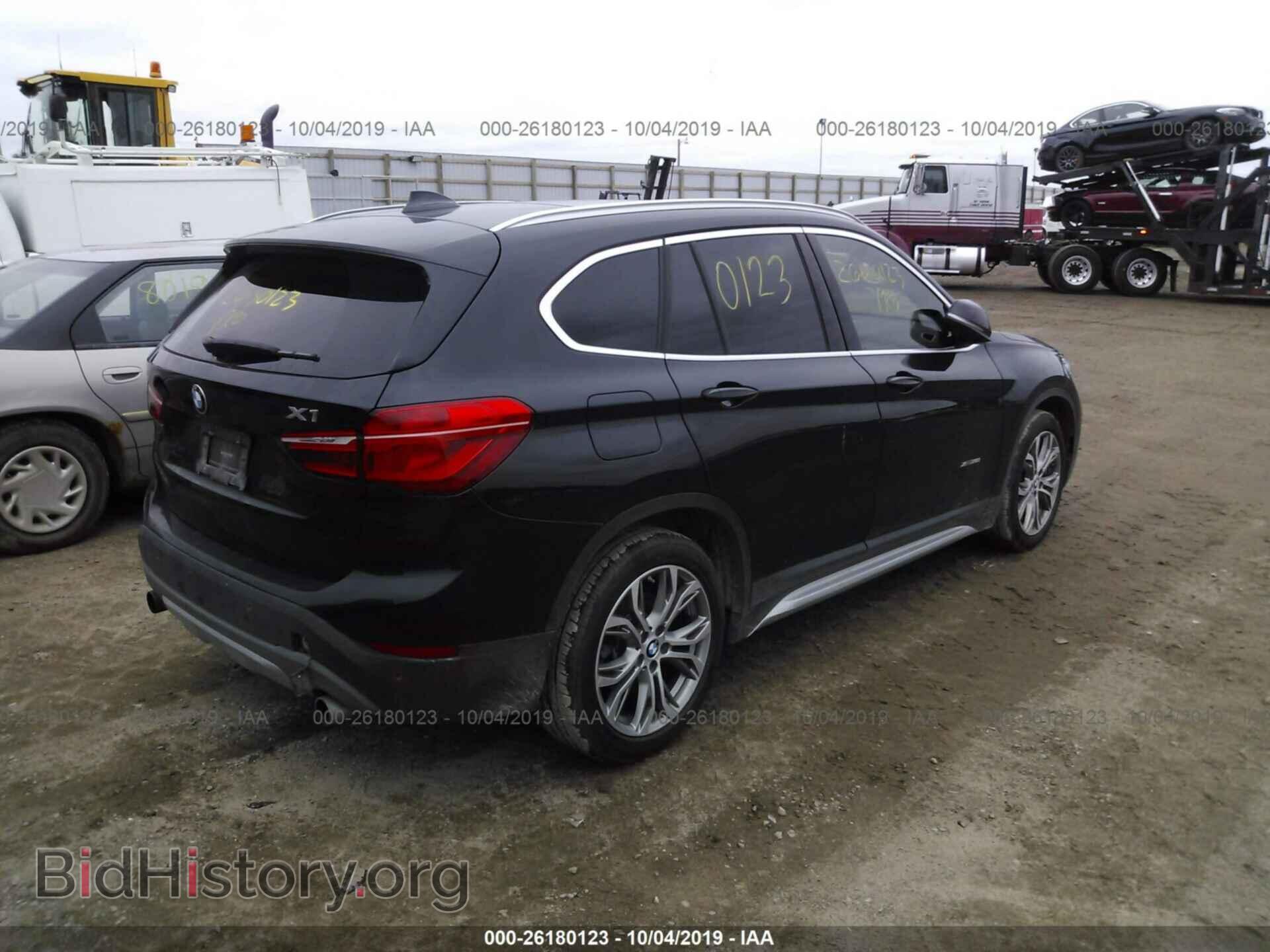 2017 BMW X1 - VIN: WBXHT3C33H5F71942 - Фото 4