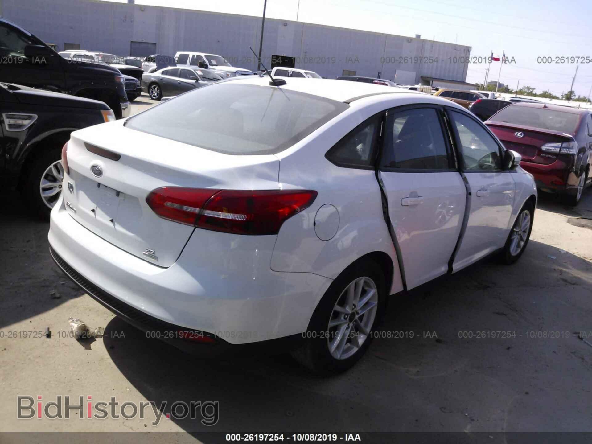 2017 FORD FOCUS - VIN: 1FADP3FE0HL307606 - Фото 4