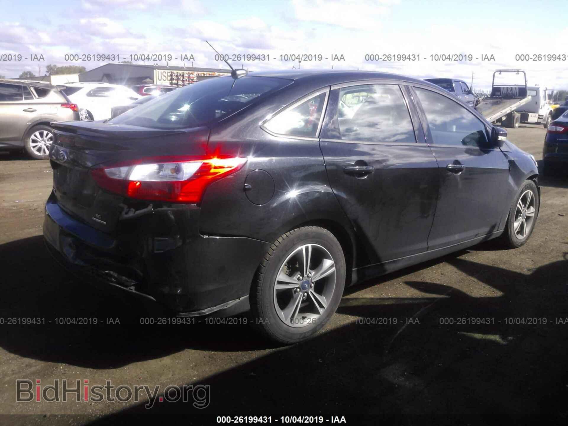 2014 FORD FOCUS - VIN: 1FADP3F29EL418916 - Photo 4