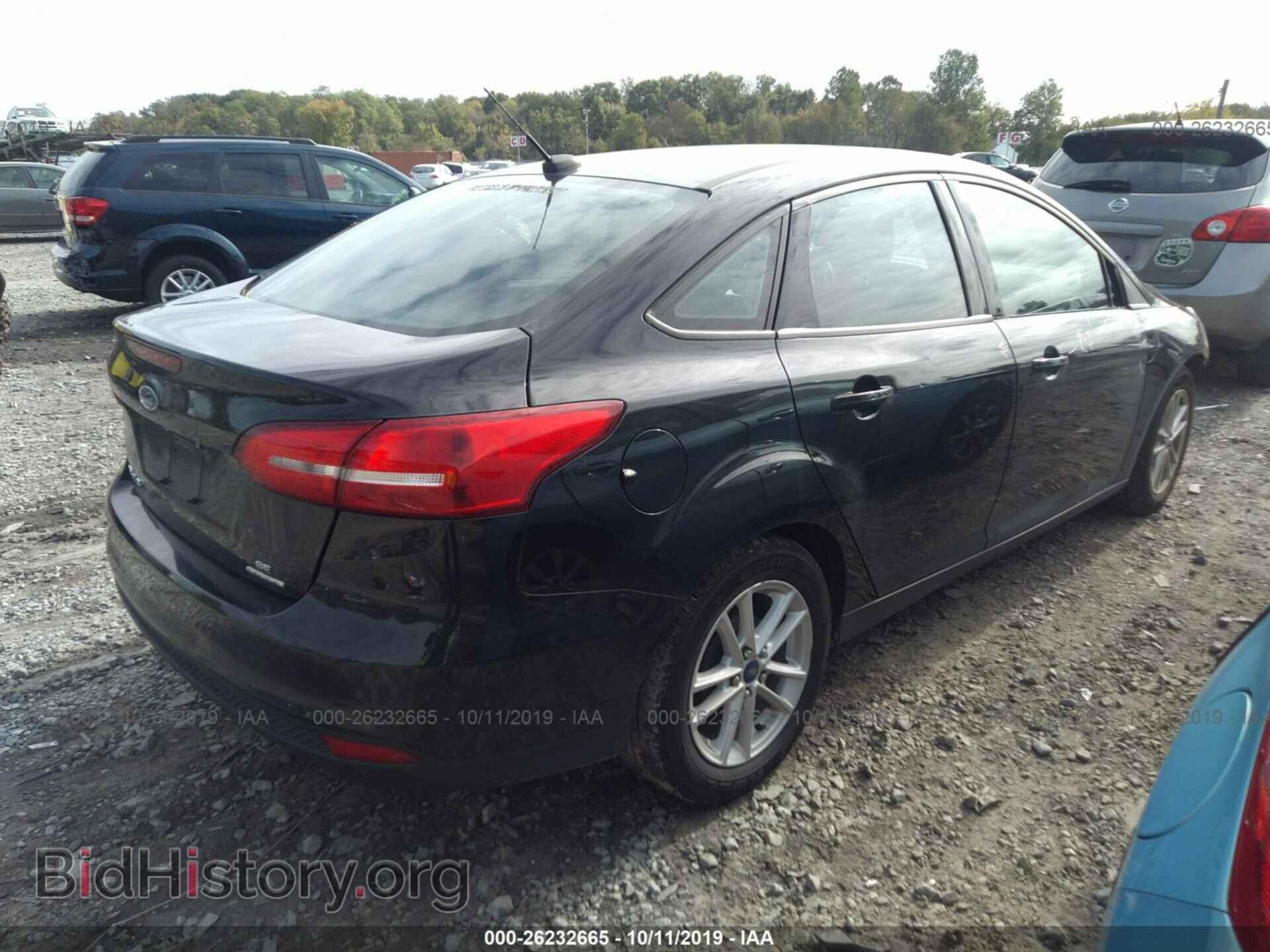 2015 FORD FOCUS - VIN: 1FADP3F25FL230900 - Photo 4