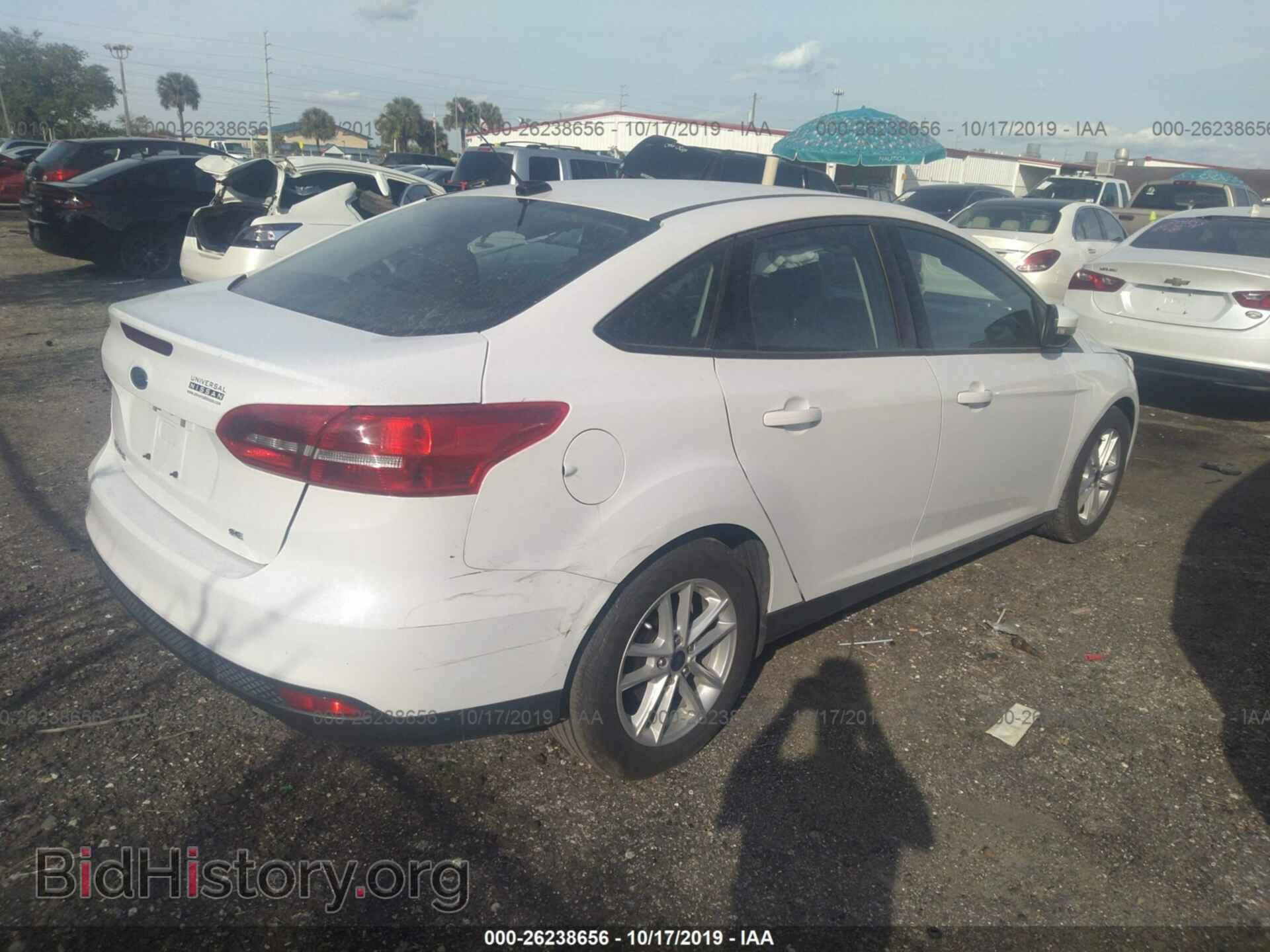 2016 FORD FOCUS - VIN: 1FADP3F21GL283322 - Photo 4