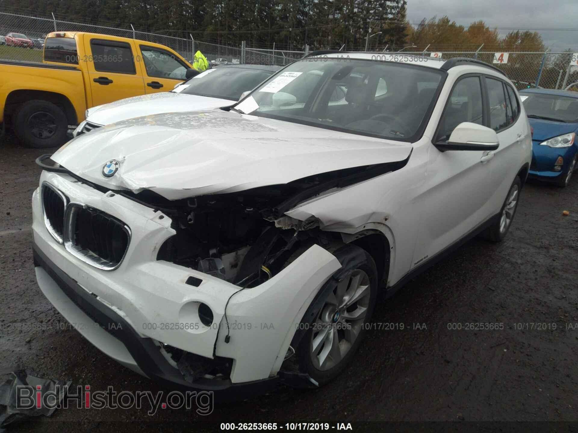 2014 BMW X1 - VIN: WBAVL1C51EVR94885 - Фото 2