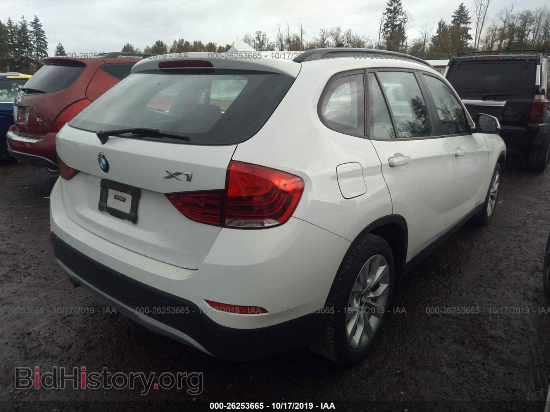 2014 BMW X1 - VIN: WBAVL1C51EVR94885 - Фото 4